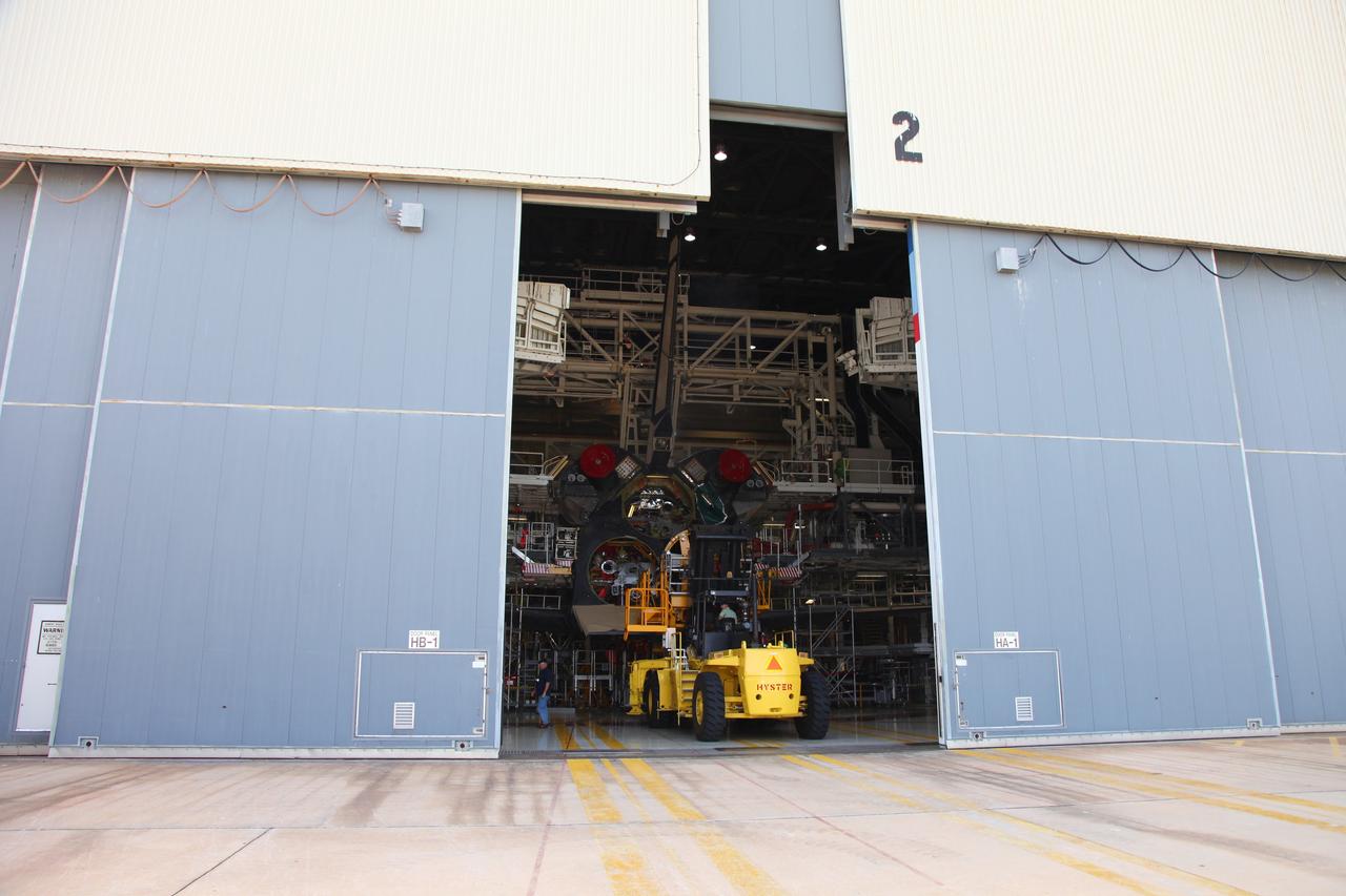 CAPE CANAVERAL, Fla. -- In Orbiter Processing Facility-2 at NASA’s Kennedy Space Center in Florida, technicians, using a Hyster forklift, have removed Engine #1, the final engine to be removed from space shuttle Atlantis. The forklift will be used to transport the engine to the Engine Shop for possible future use. Each of the three space shuttle main engines is 14 feet long and weighs 7,800 pounds.In Orbiter Processing Facility-2 at NASA’s Kennedy Space Center in Florida, technicians used a Hyster forklift to remove Engine #1, the final engine to be removed from space shuttle Atlantis. The forklift will be used to transport the engine to the Engine Shop for possible future use. Each of the three space shuttle main engines is 14 feet long and weighs 7,800 pounds. Removal of the space shuttle main engines is part of the Transition and Retirement work that is being performed in order to prepare Atlantis for eventual display at the Kennedy Space Center Visitor Complex in Florida. Photo credit: Frankie Martin