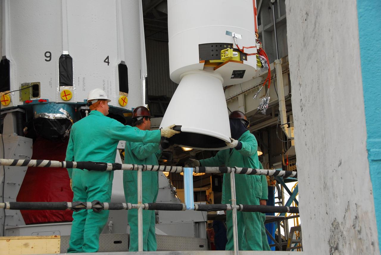VANDENBERG AIR FORCE BASE, Calif. -- At Vandenberg Air Force Base in California, technicians check the position of a solid rocket motor for the United Launch Alliance Delta II that will carry NASA's National Polar-orbiting Operational Environmental Satellite System Preparatory Project (NPP) satellite at NASA's Space Launch Complex-2. NPP represents a critical first step in building the next-generation of Earth-observing satellites. NPP will carry the first of the new sensors developed for this satellite fleet, now known as the Joint Polar Satellite System (JPSS) to be launched in 2016. NPP is the bridge between NASA's Earth Observing System (EOS) satellites and the forthcoming series of JPSS satellites. The mission will test key technologies and instruments for the JPSS missions. NPP is targeted to launch Oct. 25. For more information, visit http://www.nasa.gov/NPP. Photo credit: NASA/VAFB, Dan Liberotti