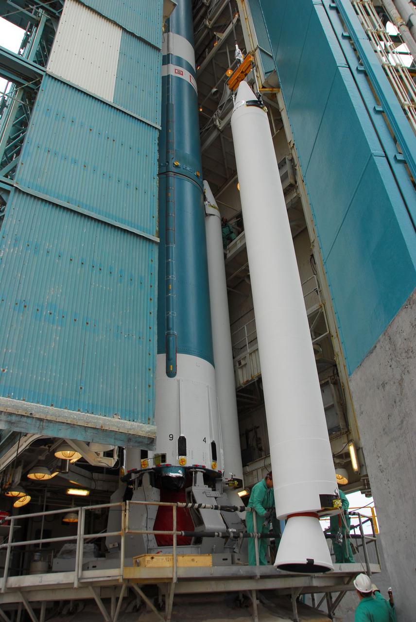VANDENBERG AIR FORCE BASE, Calif. -- At Vandenberg Air Force Base in California, a crane is used to lift and position a solid rocket motor for attachment to the United Launch Alliance Delta II that will carry NASA's National Polar-orbiting Operational Environmental Satellite System Preparatory Project (NPP) satellite at NASA's Space Launch Complex-2. NPP represents a critical first step in building the next-generation of Earth-observing satellites. NPP will carry the first of the new sensors developed for this satellite fleet, now known as the Joint Polar Satellite System (JPSS) to be launched in 2016. NPP is the bridge between NASA's Earth Observing System (EOS) satellites and the forthcoming series of JPSS satellites. The mission will test key technologies and instruments for the JPSS missions. NPP is targeted to launch Oct. 25. For more information, visit http://www.nasa.gov/NPP. Photo credit: NASA/VAFB, Dan Liberotti