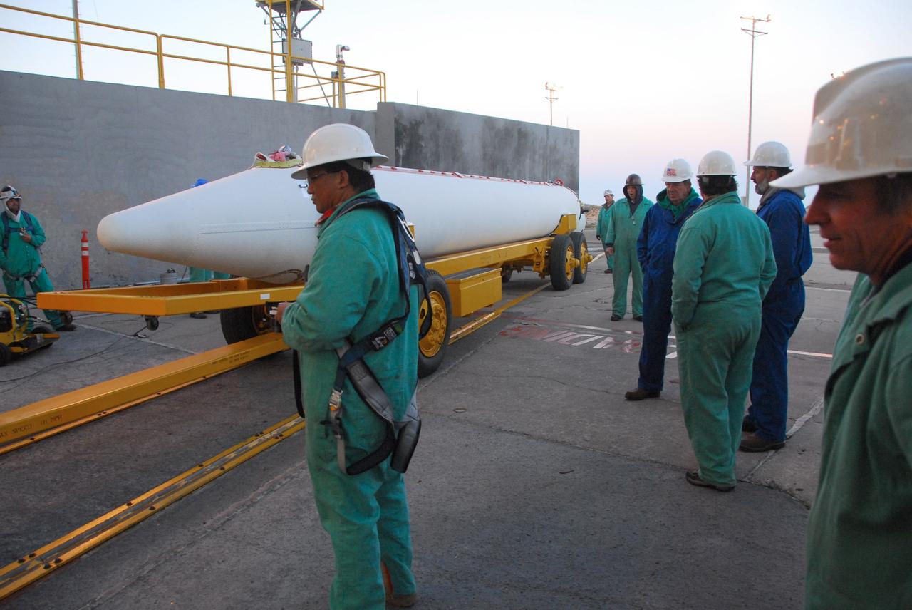 VANDENBERG AIR FORCE BASE, Calif. -- At Vandenberg Air Force Base in California, a solid rocket motor for the United Launch Alliance Delta II that will carry NASA’s National Polar-orbiting Operational Environmental Satellite System Preparatory Project (NPP) satellite into space arrives at NASA’s Space Launch Complex-2. NPP represents a critical first step in building the next-generation of Earth-observing satellites. NPP will carry the first of the new sensors developed for this satellite fleet, now known as the Joint Polar Satellite System (JPSS) to be launched in 2016. NPP is the bridge between NASA's Earth Observing System (EOS) satellites and the forthcoming series of JPSS satellites. The mission will test key technologies and instruments for the JPSS missions. NPP is targeted to launch Oct. 25. For more information, visit http://www.nasa.gov/NPP. Photo credit: NASA/VAFB, Mark Mackley