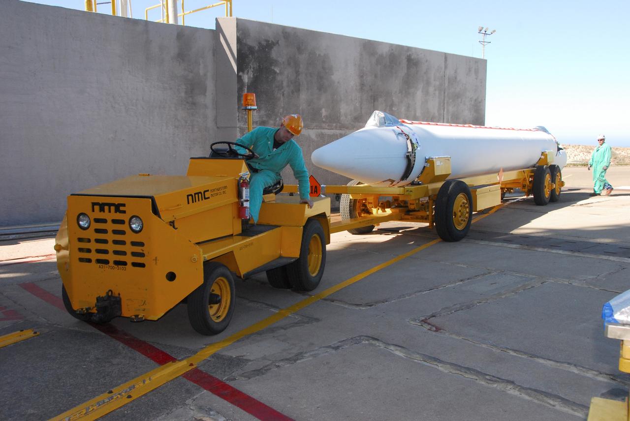 VANDENBERG AIR FORCE BASE, Calif. -- At Vandenberg Air Force Base in California, a solid rocket motor for the United Launch Alliance Delta II that will carry NASA’s National Polar-orbiting Operational Environmental Satellite System Preparatory Project (NPP) satellite into space arrives at NASA’s Space Launch Complex-2. NPP represents a critical first step in building the next-generation of Earth-observing satellites. NPP will carry the first of the new sensors developed for this satellite fleet, now known as the Joint Polar Satellite System (JPSS) to be launched in 2016. NPP is the bridge between NASA's Earth Observing System (EOS) satellites and the forthcoming series of JPSS satellites. The mission will test key technologies and instruments for the JPSS missions. NPP is targeted to launch Oct. 25. For more information, visit http://www.nasa.gov/NPP. Photo credit: NASA/VAFB, Mark Mackley