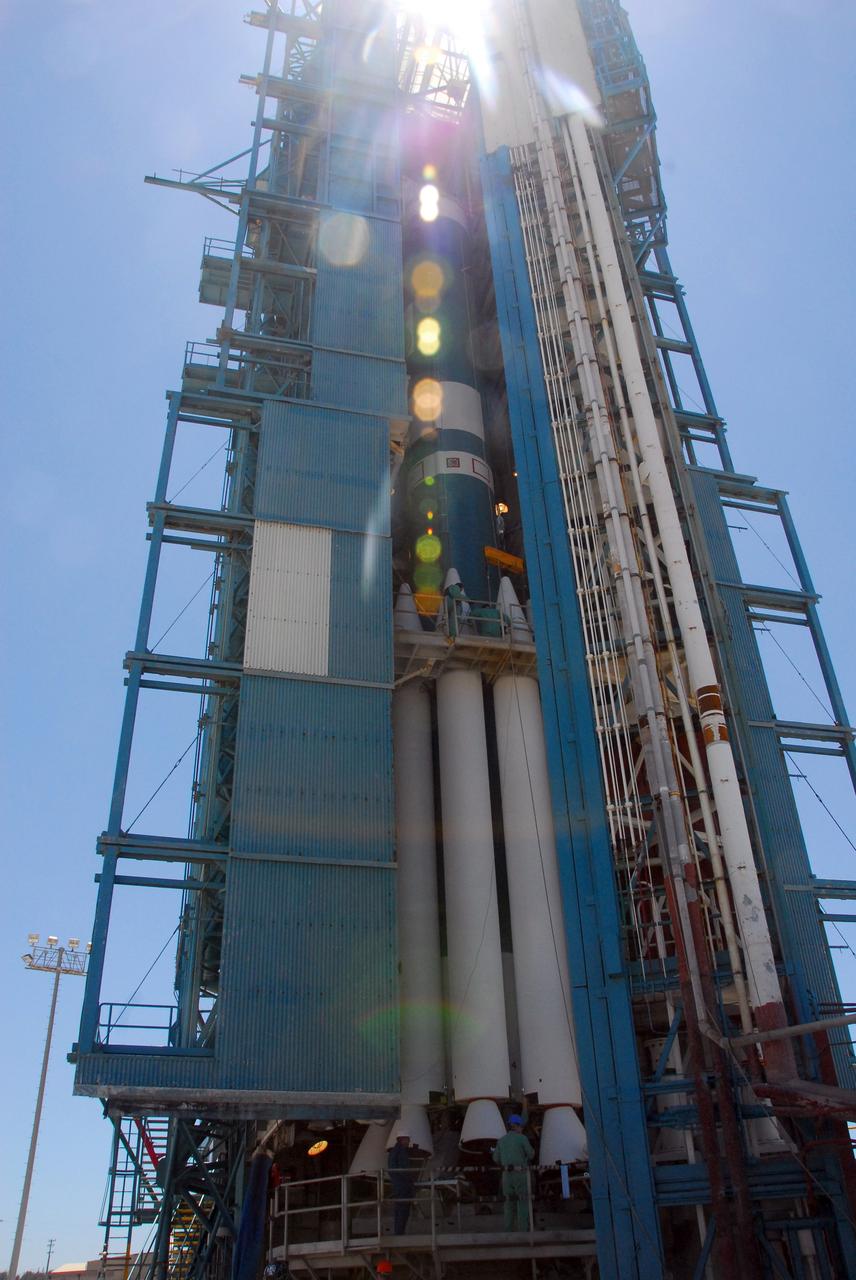 VANDENBERG AIR FORCE BASE, Calif. -- At Space Launch Compmlex-2 at Vandenberg Air Force Base in California, a work platform has been placed around the United Launch Alliance Delta II rocket so that technicians can complete the work to attach the solid rocket motors. The Delta II will carry NASA’s National Polar-orbiting Operational Environmental Satellite System Preparatory Project (NPP) satellite into space. NPP represents a critical first step in building the next-generation of Earth-observing satellites. NPP will carry the first of the new sensors developed for this satellite fleet, now known as the Joint Polar Satellite System (JPSS) to be launched in 2016. NPP is the bridge between NASA's Earth Observing System (EOS) satellites and the forthcoming series of JPSS satellites. The mission will test key technologies and instruments for the JPSS missions. NPP is targeted to launch Oct. 25. For more information, visit http://www.nasa.gov/NPP. Photo credit: NASA/VAFB, Mark Mackley
