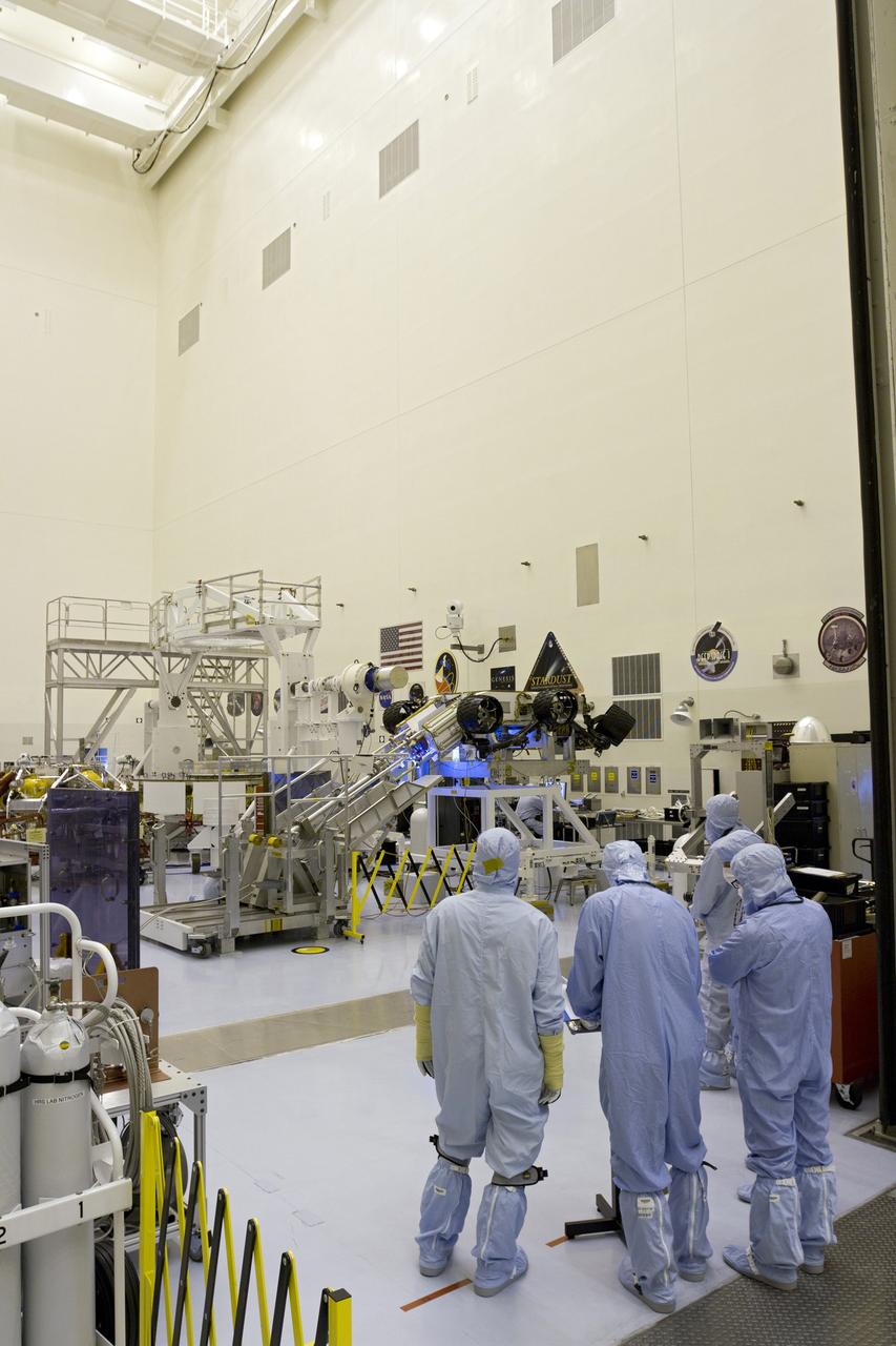 CAPE CANAVERAL, Fla. -- In the high bay of the Payload Hazardous Servicing Facility (PHSF) at NASA's Kennedy Space Center in Florida, spacecraft technicians from NASA's Jet Propulsion Laboratory prepare to attach the multi-mission radioisotope thermoelectric generator (MMRTG) for NASA's Mars Science Laboratory (MSL) mission onto the aft of the Curiosity rover for a fit check with the aid of the MMRTG integration cart. The MMRTG then will be removed and installed on the rover for launch at the pad.    The MMRTG will generate the power needed for the mission from the natural decay of plutonium-238, a non-weapons-grade form of the radioisotope. Heat given off by this natural decay will provide constant power through the day and night during all seasons. Curiosity, MSL's car-sized rover, has 10 science instruments designed to search for signs of life, including methane, and help determine if the gas is from a biological or geological source. Waste heat from the MMRTG will be circulated throughout the rover system to keep instruments, computers, mechanical devices and communications systems within their operating temperature ranges. Launch of MSL aboard a United Launch Alliance Atlas V rocket is planned for Nov. 25 from Space Launch Complex 41 on Cape Canaveral Air Force Station. For more information, visit http://www.nasa.gov/msl. Photo credit: NASA/Cory Huston