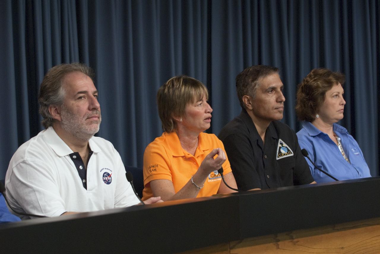 CAPE CANAVERAL, Fla. – – A Gravity Recovery and Interior Laboratory (GRAIL) mission science briefing is held in the NASA Press Site auditorium at NASA's Kennedy Space Center in Florida. From left are Robert Fogel, NASA’s GRAIL program scientist; Maria Zuber, GRAIL principal investigator with the Massachusetts Institute of Technology; Sami Asmar, GRAIL deputy project scientist, NASA’s Jet Propulsion Laboratory; and Leesa Hubbard, teacher in residence, Sally Ride Science, San Diego. GRAIL is scheduled to launch Sept. 8 aboard a United Launch Alliance Delta II Heavy rocket from Cape Canaveral Air Force Station in Florida.    GRAIL will fly twin spacecraft in tandem around the moon to precisely measure and map variations in the moon's gravitational field. The mission will provide the most accurate global gravity field to date for any planet, including Earth. This detailed information will reveal differences in the density of the moon's crust and mantle and will help answer fundamental questions about the moon's internal structure, thermal evolution, and history of collisions with asteroids. The aim is to map the moon's gravity field so completely that future moon vehicles can safely navigate anywhere on the moon’s surface. For more information, visit http://www.nasa.gov/grail. Photo credit: NASA/Kim Shiflett