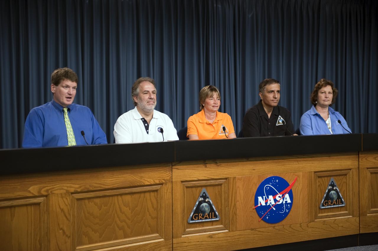 CAPE CANAVERAL, Fla. – – A Gravity Recovery and Interior Laboratory (GRAIL) mission science briefing is held in the NASA Press Site auditorium at NASA's Kennedy Space Center in Florida. From left are DC Agle, NASA Public Affairs; Robert Fogel, NASA’s GRAIL program scientist; Maria Zuber, GRAIL principal investigator with the Massachusetts Institute of Technology; Sami Asmar, GRAIL deputy project scientist, NASA’s Jet Propulsion Laboratory; and Leesa Hubbard, teacher in residence, Sally Ride Science, San Diego. GRAIL is scheduled to launch Sept. 8 aboard a United Launch Alliance Delta II Heavy rocket from Cape Canaveral Air Force Station in Florida.    GRAIL will fly twin spacecraft in tandem around the moon to precisely measure and map variations in the moon's gravitational field. The mission will provide the most accurate global gravity field to date for any planet, including Earth. This detailed information will reveal differences in the density of the moon's crust and mantle and will help answer fundamental questions about the moon's internal structure, thermal evolution, and history of collisions with asteroids. The aim is to map the moon's gravity field so completely that future moon vehicles can safely navigate anywhere on the moon’s surface. For more information, visit http://www.nasa.gov/grail. Photo credit: NASA/Kim Shiflett
