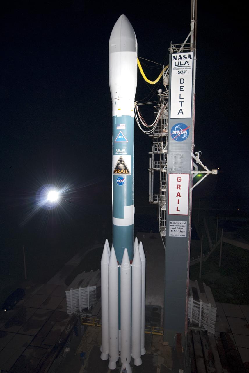 CAPE CANAVERAL, Fla. -- At Space Launch Complex 17B on Cape Canaveral Air Force Station, the United Launch Alliance Delta II rocket that will launch NASA's Gravity Recovery and Interior Laboratory mission is ready for launch.  Preparations are under way to roll the mobile service tower away from the rocket.    GRAIL will fly twin spacecraft in tandem around the moon to precisely measure and map variations in the moon's gravitational field. The mission will provide the most accurate global gravity field to date for any planet, including Earth. This detailed information will reveal differences in the density of the moon's crust and mantle and will help answer fundamental questions about the moon's internal structure, thermal evolution, and history of collisions with asteroids. The aim is to map the moon's gravity field so completely that future lunar vehicles can safely navigate anywhere on the moon’s surface.  Launch is scheduled for 8:37:06 a.m. EDT Sept. 8.  For more information, visit http://www.nasa.gov/grail. Photo credit: NASA/Kim Shiflett