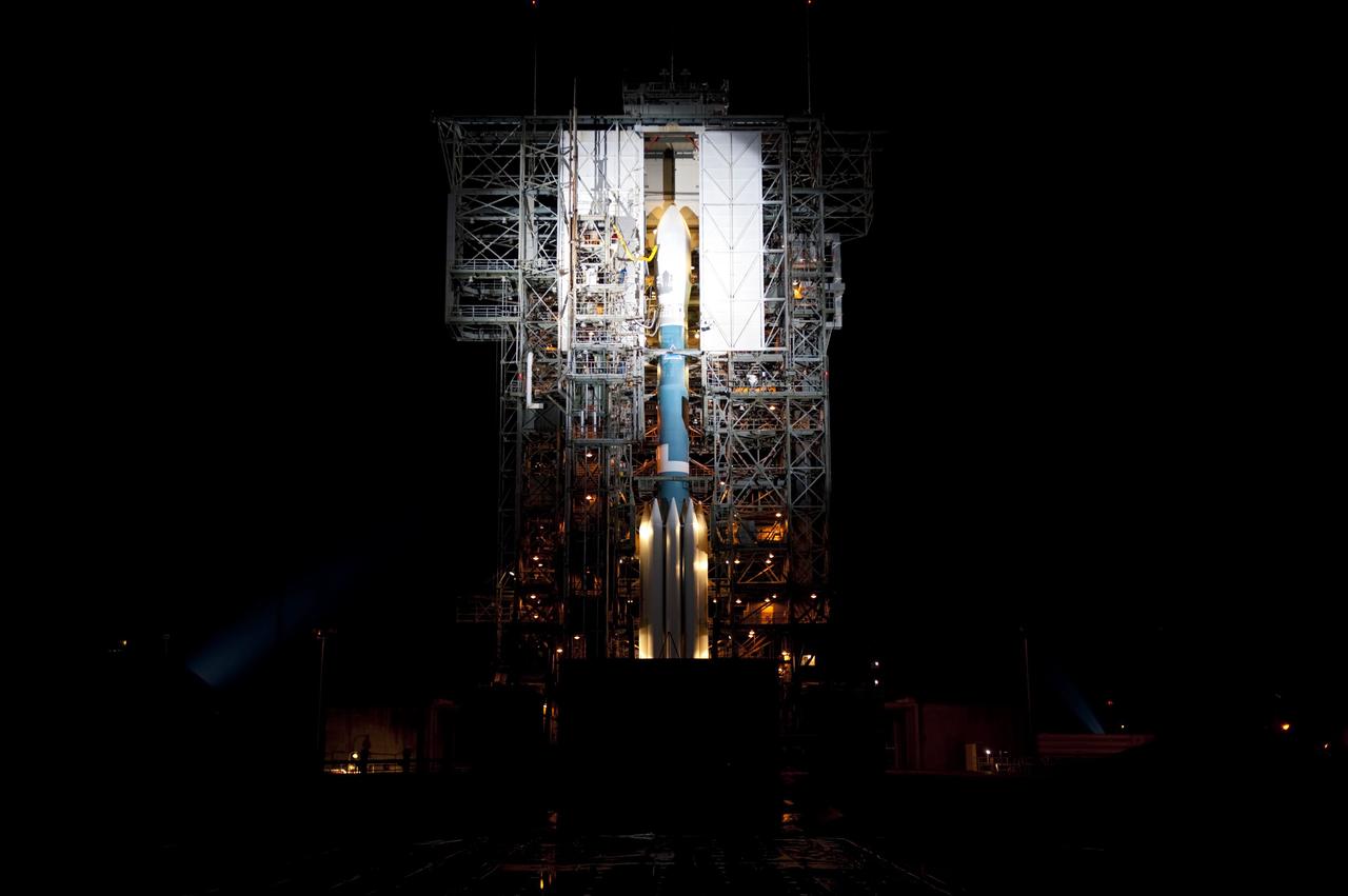 CAPE CANAVERAL, Fla. -- At Space Launch Complex 17B on Cape Canaveral Air Force Station, the start of the rollback of the mobile service tower from the United Launch Alliance Delta II rocket that will launch NASA's Gravity Recovery and Interior Laboratory mission is moments away.    GRAIL will fly twin spacecraft in tandem around the moon to precisely measure and map variations in the moon's gravitational field. The mission will provide the most accurate global gravity field to date for any planet, including Earth. This detailed information will reveal differences in the density of the moon's crust and mantle and will help answer fundamental questions about the moon's internal structure, thermal evolution, and history of collisions with asteroids. The aim is to map the moon's gravity field so completely that future lunar vehicles can safely navigate anywhere on the moon’s surface.  Launch is scheduled for 8:37:06 a.m. EDT Sept. 8.  For more information, visit http://www.nasa.gov/grail. Photo credit: NASA/Kim Shiflett