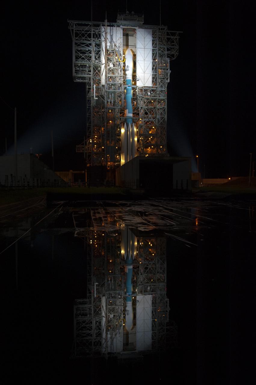 CAPE CANAVERAL, Fla. -- At Space Launch Complex 17B on Cape Canaveral Air Force Station, evening showers create the right conditions for the United Launch Alliance Delta II rocket that will launch NASA's Gravity Recovery and Interior Laboratory mission to be reflected on the surface of the pad.  Preparations are under way to roll the mobile service tower away from the rocket.    GRAIL will fly twin spacecraft in tandem around the moon to precisely measure and map variations in the moon's gravitational field. The mission will provide the most accurate global gravity field to date for any planet, including Earth. This detailed information will reveal differences in the density of the moon's crust and mantle and will help answer fundamental questions about the moon's internal structure, thermal evolution, and history of collisions with asteroids. The aim is to map the moon's gravity field so completely that future lunar vehicles can safely navigate anywhere on the moon’s surface.  Launch is scheduled for 8:37:06 a.m. EDT Sept. 8.  For more information, visit http://www.nasa.gov/grail. Photo credit: NASA/Kim Shiflett