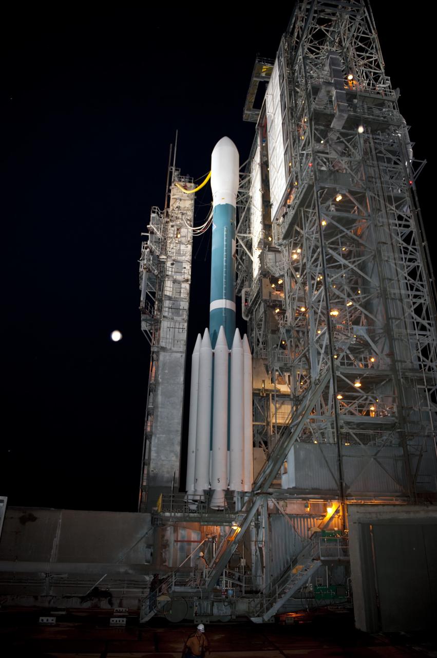 CAPE CANAVERAL, Fla. -- At Space Launch Complex 17B on Cape Canaveral Air Force Station, the mobile service tower begins to roll away from the United Launch Alliance Delta II rocket that will launch NASA's Gravity Recovery and Interior Laboratory mission.  The "rollback" began at about 11:20 p.m. EDT.    GRAIL will fly twin spacecraft in tandem around the moon to precisely measure and map variations in the moon's gravitational field. The mission will provide the most accurate global gravity field to date for any planet, including Earth. This detailed information will reveal differences in the density of the moon's crust and mantle and will help answer fundamental questions about the moon's internal structure, thermal evolution, and history of collisions with asteroids. The aim is to map the moon's gravity field so completely that future lunar vehicles can safely navigate anywhere on the moon’s surface.  Launch is scheduled for 8:37:06 a.m. EDT Sept. 8.  For more information, visit http://www.nasa.gov/grail. Photo credit: NASA/Kim Shiflett