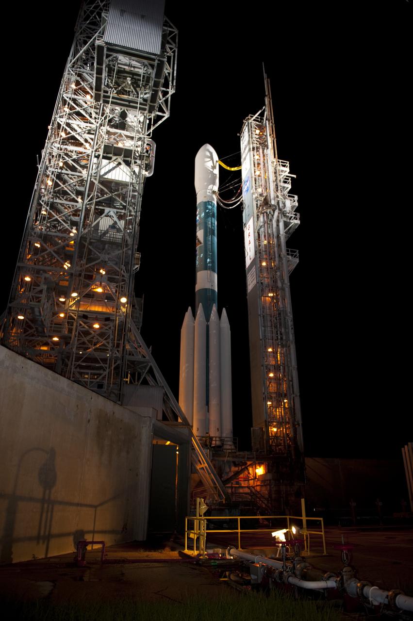 CAPE CANAVERAL, Fla. -- At Space Launch Complex 17B on Cape Canaveral Air Force Station, the mobile service tower rolls away from the United Launch Alliance Delta II rocket that will launch NASA's Gravity Recovery and Interior Laboratory mission.  The "rollback" began at about 11:20 p.m. EDT.    GRAIL will fly twin spacecraft in tandem around the moon to precisely measure and map variations in the moon's gravitational field. The mission will provide the most accurate global gravity field to date for any planet, including Earth. This detailed information will reveal differences in the density of the moon's crust and mantle and will help answer fundamental questions about the moon's internal structure, thermal evolution, and history of collisions with asteroids. The aim is to map the moon's gravity field so completely that future lunar vehicles can safely navigate anywhere on the moon’s surface.  Launch is scheduled for 8:37:06 a.m. EDT Sept. 8.  For more information, visit http://www.nasa.gov/grail. Photo credit: NASA/Kim Shiflett