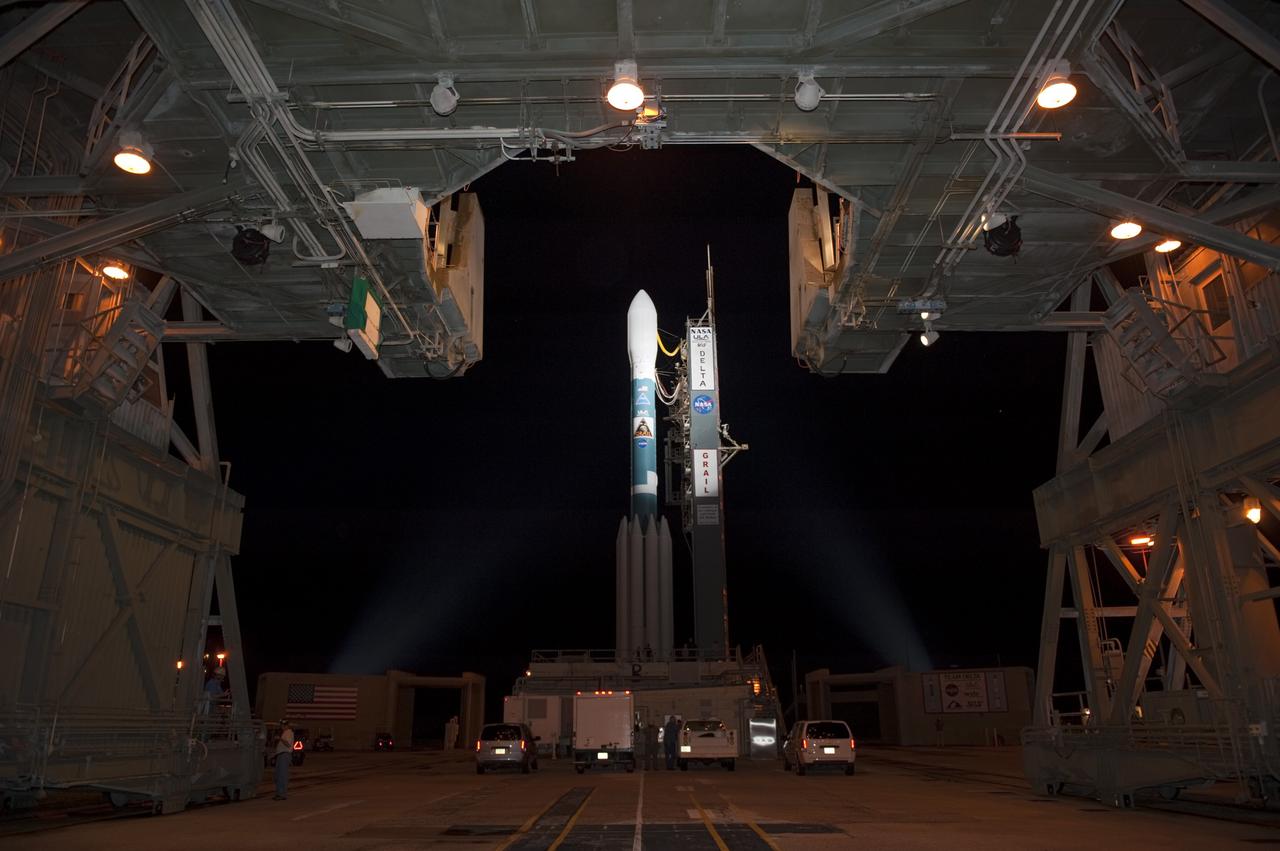 CAPE CANAVERAL, Fla. -- At Space Launch Complex 17B on Cape Canaveral Air Force Station, the mobile service tower slowly rolls away from the United Launch Alliance Delta II rocket that will launch NASA's Gravity Recovery and Interior Laboratory mission.  The "rollback" began at about 11:20 p.m. EDT.    GRAIL will fly twin spacecraft in tandem around the moon to precisely measure and map variations in the moon's gravitational field. The mission will provide the most accurate global gravity field to date for any planet, including Earth. This detailed information will reveal differences in the density of the moon's crust and mantle and will help answer fundamental questions about the moon's internal structure, thermal evolution, and history of collisions with asteroids. The aim is to map the moon's gravity field so completely that future lunar vehicles can safely navigate anywhere on the moon’s surface.  Launch is scheduled for 8:37:06 a.m. EDT Sept. 8.  For more information, visit http://www.nasa.gov/grail. Photo credit: NASA/Kim Shiflett