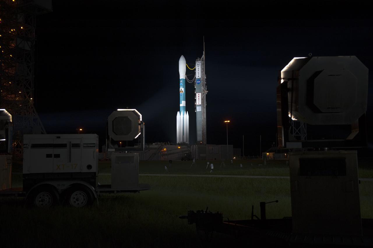 CAPE CANAVERAL, Fla. -- At Space Launch Complex 17B on Cape Canaveral Air Force Station, the United Launch Alliance Delta II rocket that will launch NASA's Gravity Recovery and Interior Laboratory mission undergoes final preparations for launch.  The "rollback" of the mobile service tower began at about 11:20 p.m. EDT Sept. 7.    GRAIL will fly twin spacecraft in tandem around the moon to precisely measure and map variations in the moon's gravitational field. The mission will provide the most accurate global gravity field to date for any planet, including Earth. This detailed information will reveal differences in the density of the moon's crust and mantle and will help answer fundamental questions about the moon's internal structure, thermal evolution, and history of collisions with asteroids. The aim is to map the moon's gravity field so completely that future lunar vehicles can safely navigate anywhere on the moon’s surface.  Launch is scheduled for 8:37:06 a.m. EDT Sept. 8.  For more information, visit http://www.nasa.gov/grail. Photo credit: NASA/Kim Shiflett