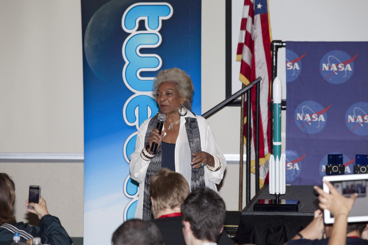 CAPE CANAVERAL, Fla. – Actress Nichelle Nichols (Lt. Uhura on Star Trek) speaks to a group of Tweetup participants at the Kennedy Space Center Visitor Complex in Florida during prelaunch activities for the agency’s Gravity Recovery and Interior Laboratory (GRAIL) mission. Participants toured NASA’s Kennedy Space Center and got a close-up view of Space Launch Complex 17B at Cape Canaveral Air Force Station. The tweeters will share their experiences with followers through the social networking site Twitter. GRAIL will fly twin spacecraft in tandem around the moon to precisely measure and map variations in the moon’s gravitational field. The mission will provide the most accurate global gravity field to date for any planet, including Earth. This detailed information will reveal differences in the density of the moon’s crust and mantle and will help answer fundamental questions about the moon’s internal structure, thermal evolution, and history of collisions with asteroids. The aim is to map the moon’s gravity field so completely that future lunar vehicles can safely navigate anywhere on the moon’s surface. Launch is scheduled for 8:37:06 a.m. EDT Sept. 8. For more information, visit http://www.nasa.gov/grail. Photo credit: NASA/Gianni Woods
