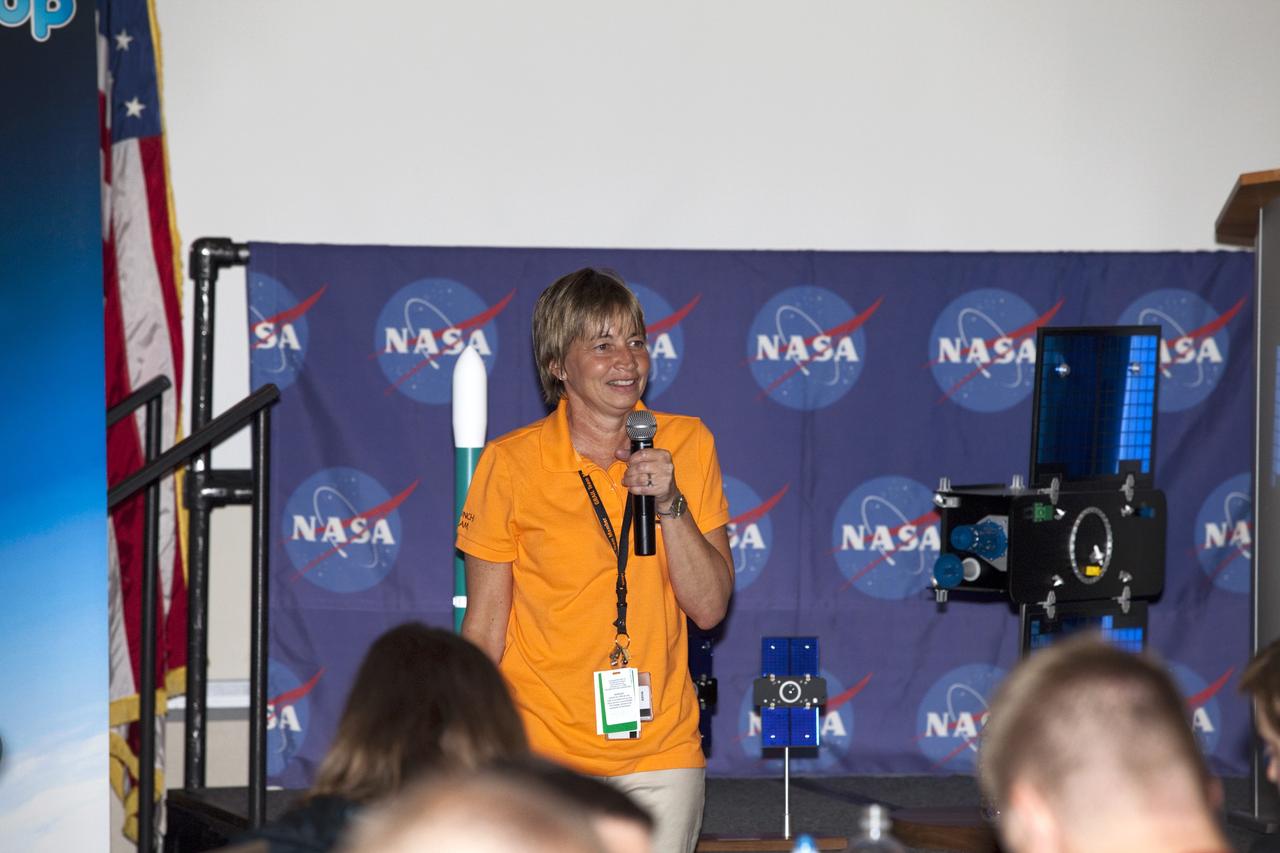 CAPE CANAVERAL, Fla. – Maria Zuber, GRAIL principal investigator at the Massachusetts Institute of Technology in Cambridge, speaks to a group of Tweetup participants at the Kennedy Space Center Visitor Complex in Florida during prelaunch activities for NASA's Gravity Recovery and Interior Laboratory (GRAIL) mission. Participants toured NASA’s Kennedy Space Center and got a close-up view of Space Launch Complex 17B at Cape Canaveral Air Force Station. The tweeters will share their experiences with followers through the social networking site Twitter.    GRAIL will fly twin spacecraft in tandem around the moon to precisely measure and map variations in the moon’s gravitational field. The mission will provide the most accurate global gravity field to date for any planet, including Earth. This detailed information will reveal differences in the density of the moon’s crust and mantle and will help answer fundamental questions about the moon’s internal structure, thermal evolution, and history of collisions with asteroids. The aim is to map the moon’s gravity field so completely that future lunar vehicles can safely navigate anywhere on the moon’s surface. Launch is scheduled for 8:37:06 a.m. EDT Sept. 8. For more information, visit http://www.nasa.gov/grail. Photo credit: NASA/Gianni Woods