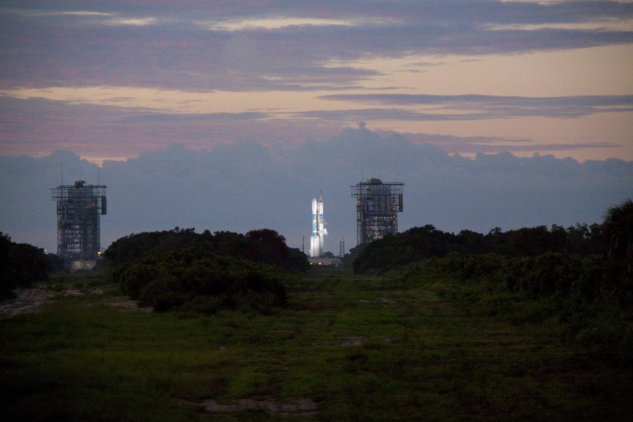 CAPE CANAVERAL, Fla. -- The sun rises over Space Launch Complex 17B on Cape Canaveral Air Force Station where the countdown to launch the United Launch Alliance Delta II Heavy rocket for NASA's Gravity Recovery and Interior Laboratory mission is under way.    GRAIL will fly twin spacecraft in tandem around the moon to precisely measure and map variations in the moon's gravitational field. The mission will provide the most accurate global gravity field to date for any planet, including Earth. This detailed information will reveal differences in the density of the moon's crust and mantle and will help answer fundamental questions about the moon's internal structure, thermal evolution, and history of collisions with asteroids. The aim is to map the moon's gravity field so completely that future lunar vehicles can safely navigate anywhere on the moon’s surface.  Launch is scheduled for 8:37:06 a.m. EDT Sept. 8.  For more information, visit http://www.nasa.gov/grail. Photo credit: NASA