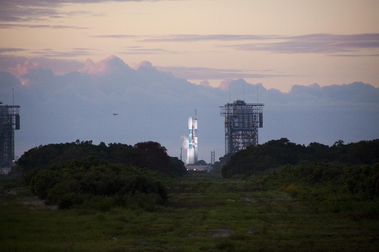 CAPE CANAVERAL, Fla. -- Launch preparations are under way as dawn breaks at Space Launch Complex 17B on Cape Canaveral Air Force Station for NASA's Gravity Recovery and Interior Laboratory mission aboard a United Launch Alliance Delta II Heavy rocket.    GRAIL will fly twin spacecraft in tandem around the moon to precisely measure and map variations in the moon's gravitational field. The mission will provide the most accurate global gravity field to date for any planet, including Earth. This detailed information will reveal differences in the density of the moon's crust and mantle and will help answer fundamental questions about the moon's internal structure, thermal evolution, and history of collisions with asteroids. The aim is to map the moon's gravity field so completely that future lunar vehicles can safely navigate anywhere on the moon’s surface.  Launch is scheduled for 8:37:06 a.m. EDT Sept. 8.  For more information, visit http://www.nasa.gov/grail. Photo credit: NASA