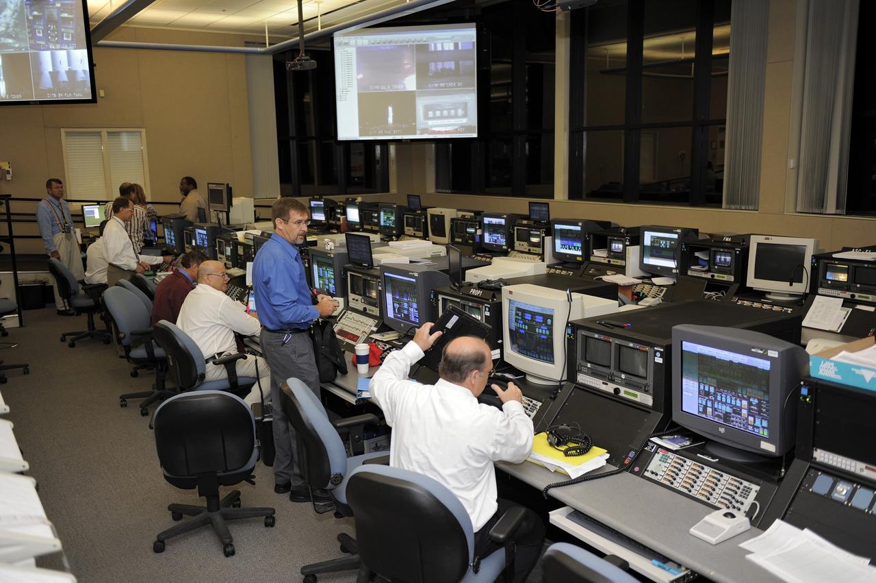 CAPE CANAVERAL, Fla. -- On Cape Canaveral Air Force Station in Florida, United Launch Alliance (ULA) personnel in the Delta Operations Building prepare for the launch of NASA's Gravity Recovery and Interior Laboratory mission aboard a ULA Delta II Heavy rocket.  Physical control of the rocket is maintained from the building, located about a mile from Space Launch Complex 17B.  The room functions as a "soft blockhouse" and is the room from which the computer-generated command to launch the rocket is issued two seconds before liftoff.     Launch is scheduled for 8:37:06 a.m. EDT Sept. 8.  GRAIL will fly twin spacecraft in tandem around the moon to precisely measure and map variations in the moon's gravitational field. The mission will provide the most accurate global gravity field to date for any planet, including Earth.  For more information, visit http://www.nasa.gov/grail. Photo credit: NASA/Kim Shiflett
