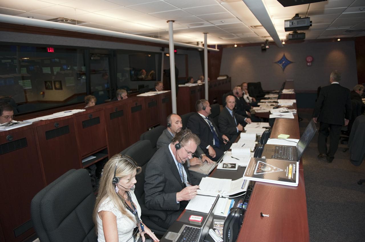 CAPE CANAVERAL, Fla. -- On Cape Canaveral Air Force Station in Florida, members of NASA's Gravity Recovery and Interior Laboratory (GRAIL) launch team monitor GRAIL's launch countdown from the Mission Directors Center in Hangar AE.  From left are Dana Grieco, launch operations manager, Analex, NASA's Launch Services Program (LSP); Bruce Reid, GRAIL mission manager, LSP; Al Sierra, manager of the Flight Project Office, LSP; Omar Baez, GRAIL assistant launch director, LSP; and Tim Dunn, GRAIL launch director, LSP; David Lehman, spacecraft mission director and GRAIL project manager, NASA's Jet Propulsion Laboratory (JPL); and John Henk, GRAIL program manager, Lockheed Martin Space Systems.    Launch is scheduled for 8:37:06 a.m. EDT Sept. 8 from Space Launch Complex 17B on Cape Canaveral Air Force Station.  GRAIL will fly twin spacecraft in tandem around the moon to precisely measure and map variations in the moon's gravitational field. The mission will provide the most accurate global gravity field to date for any planet, including Earth.  For more information, visit http://www.nasa.gov/grail. Photo credit: NASA/Kim Shiflett