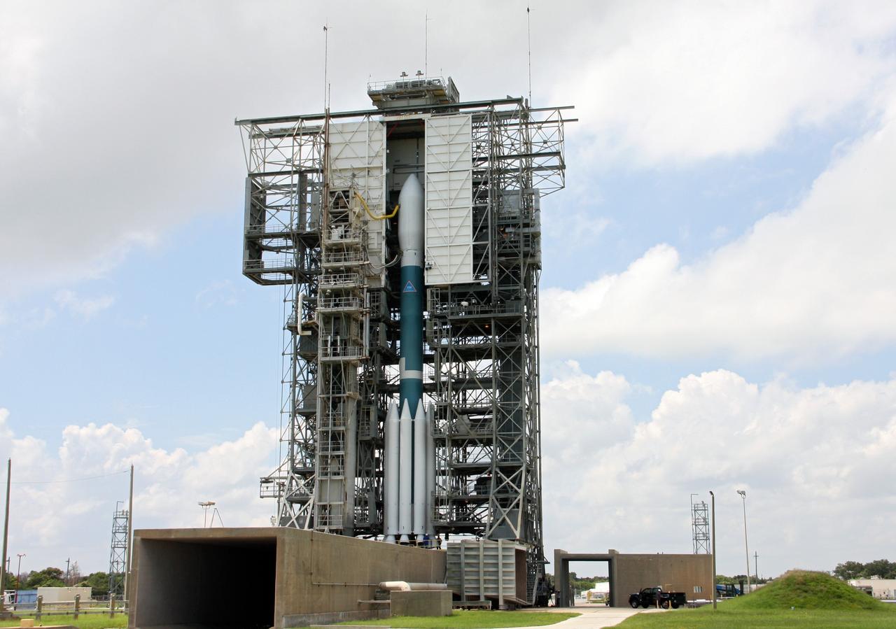 CAPE CANAVERAL, Fla. – At Space Launch Complex 17B on Cape Canaveral Air Force Station, the United Launch Alliance Delta II heavy rocket that will launch NASA's Gravity Recovery and Interior Laboratory spacecraft is rolled back around to the mobile service tower after the first launch attempt was scrubbed due to upper-level winds. GRAIL is scheduled for another launch attempt Sept.10 at 8:29:45 a.m. EDT.    GRAIL will fly twin spacecraft in tandem around the moon to precisely measure and map variations in the moon's gravitational field. The mission will provide the most accurate global gravity field to date for any planet, including Earth. This detailed information will reveal differences in the density of the moon's crust and mantle and will help answer fundamental questions about the moon's internal structure, thermal evolution, and history of collisions with asteroids. The aim is to map the moon's gravity field so completely that future moon vehicles can safely navigate anywhere on the moon’s surface. For more information, visit http://www.nasa.gov/grail. Photo credit: NASA/Ken Thornsley