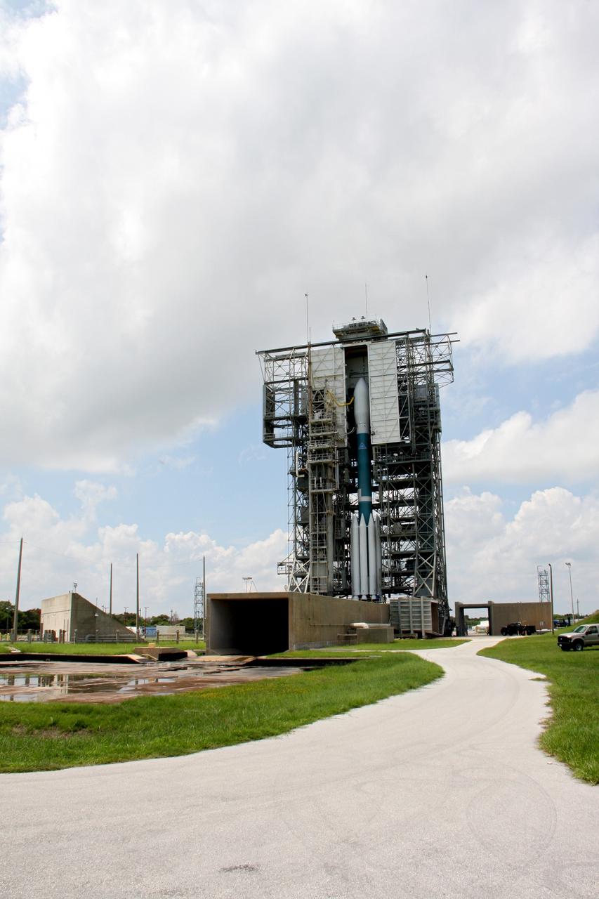 CAPE CANAVERAL, Fla. – At Space Launch Complex 17B on Cape Canaveral Air Force Station, the United Launch Alliance Delta II heavy rocket that will launch NASA's Gravity Recovery and Interior Laboratory spacecraft is rolled back around to the mobile service tower after the first launch attempt was scrubbed due to upper-level winds. GRAIL is scheduled for another launch attempt Sept.10 at 8:29:45 a.m. EDT.    GRAIL will fly twin spacecraft in tandem around the moon to precisely measure and map variations in the moon's gravitational field. The mission will provide the most accurate global gravity field to date for any planet, including Earth. This detailed information will reveal differences in the density of the moon's crust and mantle and will help answer fundamental questions about the moon's internal structure, thermal evolution, and history of collisions with asteroids. The aim is to map the moon's gravity field so completely that future moon vehicles can safely navigate anywhere on the moon’s surface. For more information, visit http://www.nasa.gov/grail. Photo credit: NASA/Ken Thornsley