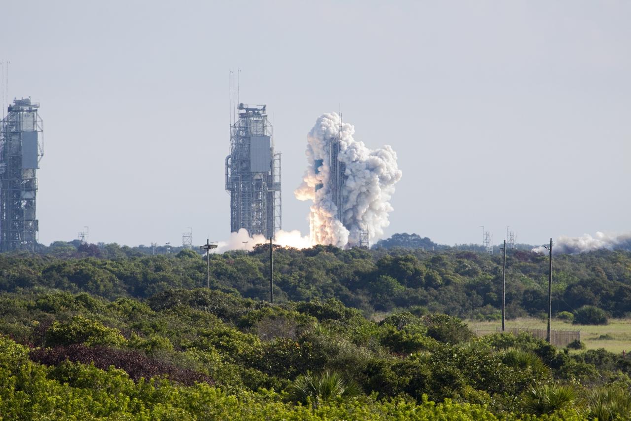 CAPE CANAVERAL, Fla. – Plumes of smoke surround Space Launch Complex 17B on Cape Canaveral Air Force Station in Florida as a United Launch Alliance Delta II Heavy rocket lofts NASA’s Gravity Recovery and Interior Laboratory (GRAIL) mission into space. Liftoff was at 9:08:52 a.m. EDT Sept.10. GRAIL-A will separate from the second stage of the rocket at about one hour, 21 minutes after liftoff, followed by GRAIL-B at 90 minutes after launch. The spacecraft are embarking on a three-month journey to reach the moon.    GRAIL will fly twin spacecraft in tandem around the moon to precisely measure and map variations in the moon's gravitational field. The mission will provide the most accurate global gravity field to date for any planet, including Earth. This detailed information will reveal differences in the density of the moon's crust and mantle and will help answer fundamental questions about the moon's internal structure, thermal evolution, and history of collisions with asteroids. The aim is to map the moon's gravity field so completely that future moon vehicles can safely navigate anywhere on the moon’s surface. For more information, visit http://www.nasa.gov/grail. Photo credit: NASA/Darrell McCall