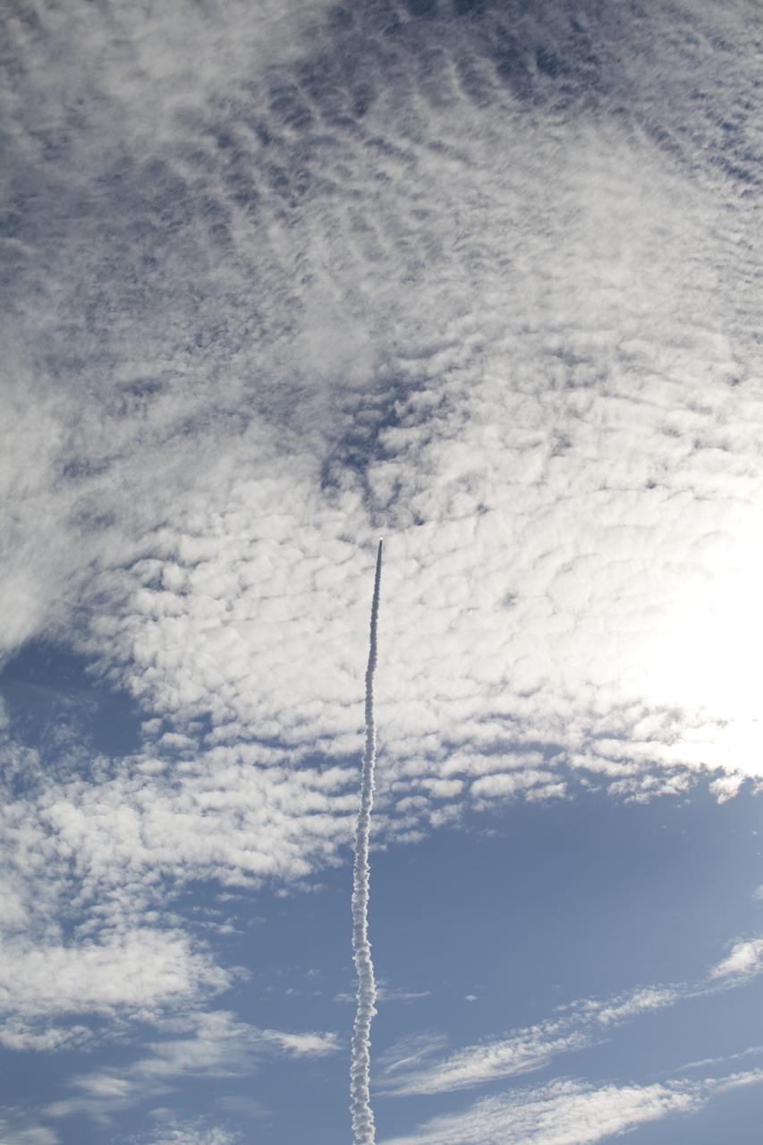 CAPE CANAVERAL, Fla. – Viewed from KARS Park 1 on Merritt Island in Florida, the United Launch Alliance Delta II Heavy rocket soars skyward after lifting off at 9:08 a.m. EDT Sept. 10 from Space Launch Complex 17B at Cape Canaveral Air Force Station. The Delta II is carrying NASA’s Gravity Recovery and Interior Laboratory (GRAIL) mission to the moon. A group of Tweetup participants viewed the launch from the park and will share their experiences with followers through the social networking site Twitter. GRAIL will fly twin spacecraft in tandem around the moon to precisely measure and map variations in the moon's gravitational field. The mission will provide the most accurate global gravity field to date for any planet, including Earth. This detailed information will reveal differences in the density of the moon's crust and mantle and will help answer fundamental questions about the moon's internal structure, thermal evolution, and history of collisions with asteroids. The aim is to map the moon's gravity field so completely that future moon vehicles can safely navigate anywhere on the moon’s surface. For more information, visit http://www.nasa.gov/grail. Photo credit: NASA/Frankie Martin