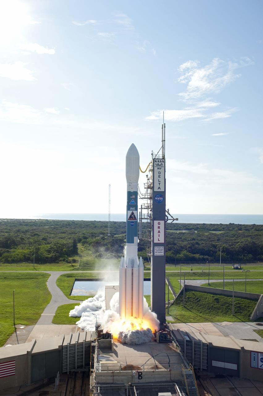 CAPE CANAVERAL, Fla. – At ignition, flames from the engines begin liftoff of the United Launch Alliance Delta II Heavy rocket carrying NASA’s twin Gravity Recovery and Interior Laboratory (GRAIL) mission off Space Launch Complex 17B on Cape Canaveral Air Force Station. The spacecraft launched at 9:08:52 a.m. EDT Sept. 10. GRAIL-A will separate from the second stage of the rocket at about one hour, 21 minutes after liftoff, followed by GRAIL-B at 90 minutes after launch. The spacecraft are embarking on a three-month journey to reach the moon.    GRAIL will fly twin spacecraft in tandem around the moon to precisely measure and map variations in the moon's gravitational field. The mission will provide the most accurate global gravity field to date for any planet, including Earth. This detailed information will reveal differences in the density of the moon's crust and mantle and will help answer fundamental questions about the moon's internal structure, thermal evolution, and history of collisions with asteroids. The aim is to map the moon's gravity field so completely that future moon vehicles can safely navigate anywhere on the moon’s surface. For more information, visit http://www.nasa.gov/grail. Photo credit: NASA/Sandra Joseph and Don Kight