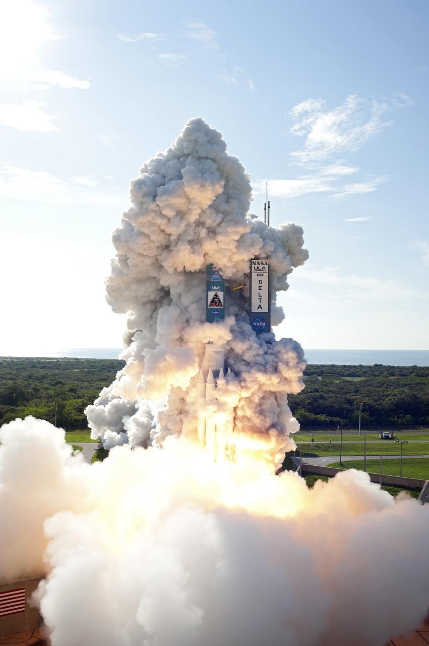 CAPE CANAVERAL, Fla. – Plumes of smoke surround of the United Launch Alliance Delta II Heavy rocket carrying NASA’s twin Gravity Recovery and Interior Laboratory (GRAIL) mission off Space Launch Complex 17B on Cape Canaveral Air Force Station In Florida. The spacecraft launched at 9:08:52 a.m. EDT Sept. 10. GRAIL-A will separate from the second stage of the rocket at about one hour, 21 minutes after liftoff, followed by GRAIL-B at 90 minutes after launch. The spacecraft are embarking on a three-month journey to reach the moon.    GRAIL will fly twin spacecraft in tandem around the moon to precisely measure and map variations in the moon's gravitational field. The mission will provide the most accurate global gravity field to date for any planet, including Earth. This detailed information will reveal differences in the density of the moon's crust and mantle and will help answer fundamental questions about the moon's internal structure, thermal evolution, and history of collisions with asteroids. The aim is to map the moon's gravity field so completely that future moon vehicles can safely navigate anywhere on the moon’s surface. For more information, visit http://www.nasa.gov/grail. Photo credit: NASA/Sandra Joseph and Don Kight