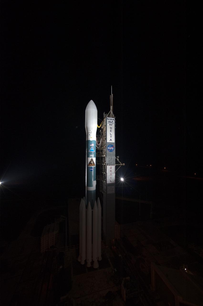 CAPE CANAVERAL, Fla. – Spotlights illuminate the United Launch Alliance Delta II Heavy rocket that will launch NASA’s twin Gravity Recovery and Interior Laboratory (GRAIL) mission from Space Launch Complex 17B on Cape Canaveral Air Force Station in Florida. Liftoff is scheduled for 9:08:52 a.m. EDT Sept. 10.    GRAIL will fly twin spacecraft in tandem around the moon to precisely measure and map variations in the moon's gravitational field. The mission will provide the most accurate global gravity field to date for any planet, including Earth. This detailed information will reveal differences in the density of the moon's crust and mantle and will help answer fundamental questions about the moon's internal structure, thermal evolution, and history of collisions with asteroids. The aim is to map the moon's gravity field so completely that future moon vehicles can safely navigate anywhere on the moon’s surface. For more information, visit http://www.nasa.gov/grail. Photo credit: NASA/Sandra Joseph and Don Kight