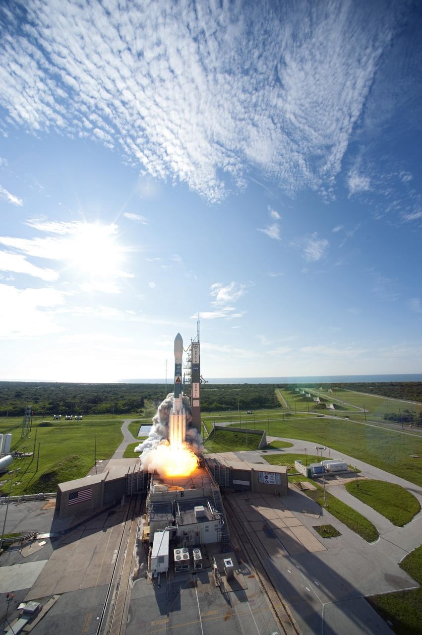 CAPE CANAVERAL, Fla. – Backdropped by a beautiful blue sky, at ignition, flames and smoke from the engines begin liftoff of the United Launch Alliance Delta II Heavy rocket carrying NASA’s twin Gravity Recovery and Interior Laboratory (GRAIL) mission off Space Launch Complex 17B on Cape Canaveral Air Force Station in Florida. At right is the pad’s mobile service tower. The spacecraft launched at 9:08:52 a.m. EDT Sept. 10. GRAIL-A will separate from the second stage of the rocket at about one hour, 21 minutes after liftoff, followed by GRAIL-B at 90 minutes after launch. The spacecraft are embarking on a three-month journey to reach the moon.     GRAIL will fly twin spacecraft in tandem around the moon to precisely measure and map variations in the moon's gravitational field. The mission will provide the most accurate global gravity field to date for any planet, including Earth. This detailed information will reveal differences in the density of the moon's crust and mantle and will help answer fundamental questions about the moon's internal structure, thermal evolution, and history of collisions with asteroids. The aim is to map the moon's gravity field so completely that future moon vehicles can safely navigate anywhere on the moon’s surface. For more information, visit http://www.nasa.gov/grail. Photo credit: NASA/Sandra Joseph and Don Kight