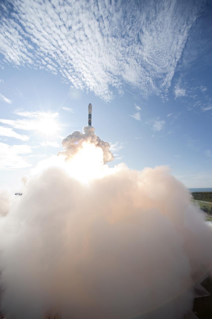 CAPE CANAVERAL, Fla. – Rising from fire and smoke under a blue sky, NASA’s twin Gravity Recovery and Interior Laboratory (GRAIL) mission launches atop a United Launch Alliance Delta II Heavy rocket leaving from Space Launch Complex 17B on Cape Canaveral Air Force Station in Florida. Liftoff was at 9:08:52 a.m. EDT Sept. 10. GRAIL-A will separate from the second stage of the rocket at about one hour, 21 minutes after liftoff, followed by GRAIL-B at 90 minutes after launch. The spacecraft are embarking on a three-month journey to reach the moon.    GRAIL will fly twin spacecraft in tandem around the moon to precisely measure and map variations in the moon's gravitational field. The mission will provide the most accurate global gravity field to date for any planet, including Earth. This detailed information will reveal differences in the density of the moon's crust and mantle and will help answer fundamental questions about the moon's internal structure, thermal evolution, and history of collisions with asteroids. The aim is to map the moon's gravity field so completely that future moon vehicles can safely navigate anywhere on the moon’s surface. For more information, visit http://www.nasa.gov/grail. Photo credit: NASA/Sandra Joseph and Don Kight