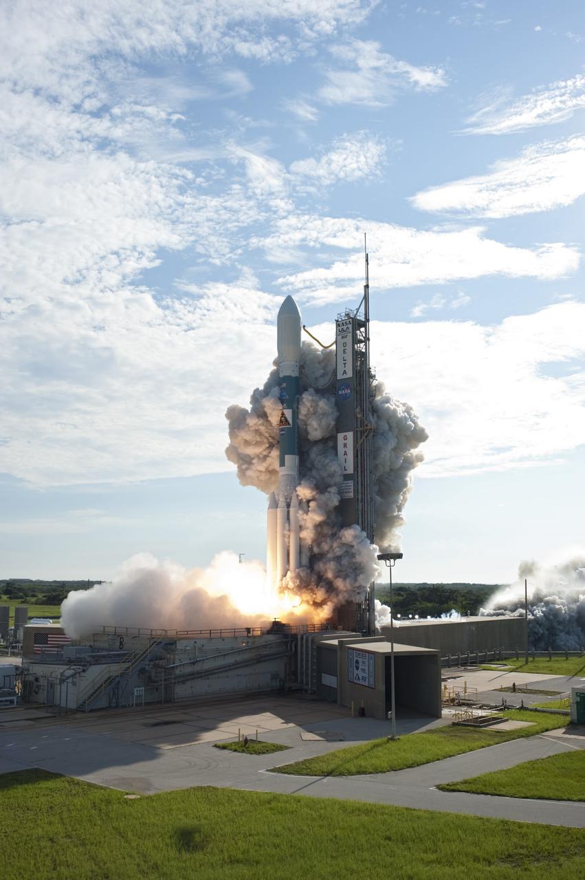 CAPE CANAVERAL, Fla. – At liftoff, flames and smoke from the engines surround the United Launch Alliance Delta II rocket carrying NASA’s twin Gravity Recovery and Interior Laboratory (GRAIL) mission off Space Launch Complex 17B on Cape Canaveral Air Force Station in Florida. The spacecraft launched at 9:08:52 a.m. EDT Sept. 10. GRAIL-A will separate from the second stage of the rocket at about one hour, 21 minutes after liftoff, followed by GRAIL-B at 90 minutes after launch. The spacecraft are embarking on a three-month journey to reach the moon.    GRAIL will fly twin spacecraft in tandem around the moon to precisely measure and map variations in the moon's gravitational field. The mission will provide the most accurate global gravity field to date for any planet, including Earth. This detailed information will reveal differences in the density of the moon's crust and mantle and will help answer fundamental questions about the moon's internal structure, thermal evolution, and history of collisions with asteroids. The aim is to map the moon's gravity field so completely that future moon vehicles can safely navigate anywhere on the moon’s surface. For more information, visit http://www.nasa.gov/grail. Photo credit: NASA/ Tony Gray and Tim Powers