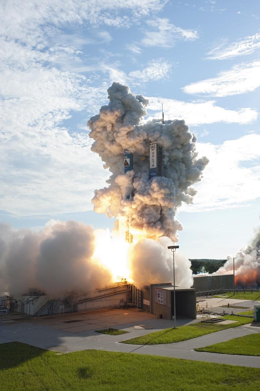 CAPE CANAVERAL, Fla. – At liftoff, plumes of smoke surround the United Launch Alliance Delta II Heavy rocket carrying NASA’s twin Gravity Recovery and Interior Laboratory (GRAIL) mission off Space Launch Complex 17B on Cape Canaveral Air Force Station in Florida. The spacecraft launched at 9:08:52 a.m. EDT Sept. 10. GRAIL-A will separate from the second stage of the rocket at about one hour, 21 minutes after liftoff, followed by GRAIL-B at 90 minutes after launch. The spacecraft are embarking on a three-month journey to reach the moon.    GRAIL will fly twin spacecraft in tandem around the moon to precisely measure and map variations in the moon's gravitational field. The mission will provide the most accurate global gravity field to date for any planet, including Earth. This detailed information will reveal differences in the density of the moon's crust and mantle and will help answer fundamental questions about the moon's internal structure, thermal evolution, and history of collisions with asteroids. The aim is to map the moon's gravity field so completely that future moon vehicles can safely navigate anywhere on the moon’s surface. For more information, visit http://www.nasa.gov/grail. Photo credit: NASA/ Tony Gray and Tim Powers