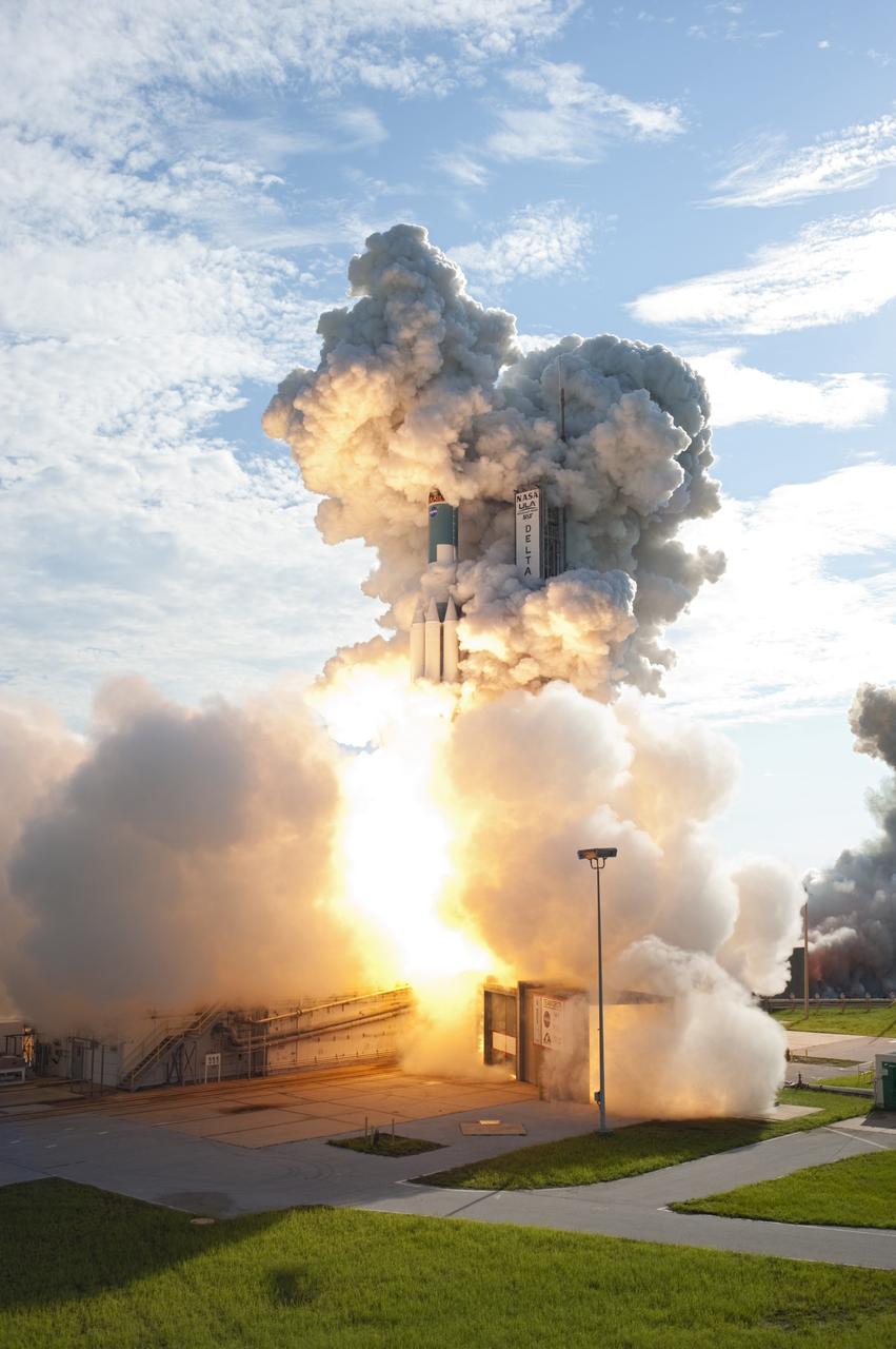 CAPE CANAVERAL, Fla. – At liftoff, plumes of smoke surround the United Launch Alliance Delta II Heavy rocket carrying NASA’s twin Gravity Recovery and Interior Laboratory (GRAIL) mission off Space Launch Complex 17B on Cape Canaveral Air Force Station in Florida. The spacecraft launched at 9:08:52 a.m. EDT Sept. 10. GRAIL-A will separate from the second stage of the rocket at about one hour, 21 minutes after liftoff, followed by GRAIL-B at 90 minutes after launch. The spacecraft are embarking on a three-month journey to reach the moon.    GRAIL will fly twin spacecraft in tandem around the moon to precisely measure and map variations in the moon's gravitational field. The mission will provide the most accurate global gravity field to date for any planet, including Earth. This detailed information will reveal differences in the density of the moon's crust and mantle and will help answer fundamental questions about the moon's internal structure, thermal evolution, and history of collisions with asteroids. The aim is to map the moon's gravity field so completely that future moon vehicles can safely navigate anywhere on the moon’s surface. For more information, visit http://www.nasa.gov/grail. Photo credit: NASA/ Tony Gray and Tim Powers