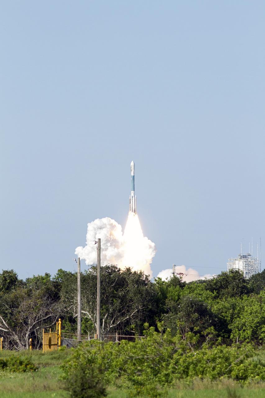 CAPE CANAVERAL, Fla. – A group of trees and bushes provides a frame for the launch of the United Launch Alliance Delta II Heavy rocket carrying NASA’s twin Gravity Recovery and Interior Laboratory (GRAIL) mission off Space Launch Complex 17B on Cape Canaveral Air Force Station in Florida. The spacecraft launched at 9:08:52 a.m. EDT Sept. 10. GRAIL-A will separate from the second stage of the rocket at about one hour, 21 minutes after liftoff, followed by GRAIL-B at 90 minutes after launch. The spacecraft are embarking on a three-month journey to reach the moon.    GRAIL will fly twin spacecraft in tandem around the moon to precisely measure and map variations in the moon's gravitational field. The mission will provide the most accurate global gravity field to date for any planet, including Earth. This detailed information will reveal differences in the density of the moon's crust and mantle and will help answer fundamental questions about the moon's internal structure, thermal evolution, and history of collisions with asteroids. The aim is to map the moon's gravity field so completely that future moon vehicles can safely navigate anywhere on the moon’s surface. For more information, visit http://www.nasa.gov/grail. Photo credit: NASA/George Roberts