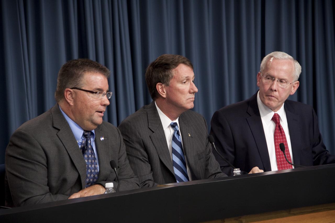 CAPE CANAVERAL, Fla. -- NASA and Alliant Techsystems (ATK) managers discuss an agreement that could accelerate the availability of U.S. commercial crew transportation capabilities with media representatives in the Press Site auditorium at NASA's Kennedy Space Center in Florida. From left are Ed Mango, Commercial Crew Program manager, NASA; Kent Rominger, vice president, Strategy and Business Development, ATK Aerospace; and John Schumacher, vice president, Space Programs, EADS North America. The unfunded Space Act Agreement (SAA) through NASA's Commercial Crew Program will allow the agency and ATK to review and discuss Liberty system requirements, safety and certification plans, computational models of rocket stage performance, and avionics architecture designs. The agreement outlines key milestones including an Initial System Design review, during which ATK will present to NASA officials the Liberty systems level requirements, preliminary design, and certification process development. For more information about NASA's Commercial Crew Program, visit http://www.nasa.gov/exploration/commercial. Photo credit: NASA/Jim Grossmann