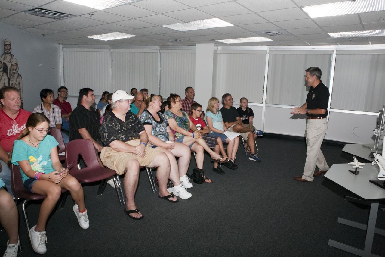 CAPE CANAVERAL, Fla. – Kennedy Space Center Director Bob Cabana speaks to children and their parents during Family Night, Sept. 10, at the U.S. Astronaut Hall of Fame in Florida.    NASA and the Kennedy Space Center Visitor Complex hosted the annual NASA family education night. The event, for fifth- through eighth-grade students and their parents, focuses on science, technology, engineering and mathematics (STEM) education activities that included astronaut appearances, a hovercraft, vortex cannon and alternative fuel vehicles. The back-to-school event is part of NASA’s Summer of Innovation initiative to provide interactive learning experiences to middle school students nationwide.  Photo credit: NASA/Amanda Diller