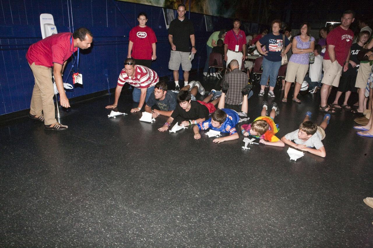 CAPE CANAVERAL, Fla. – Children participate in educational activities during Kennedy Space Center’s Family Night, Sept. 10, at the U.S. Astronaut Hall of Fame in Florida.    NASA and the Kennedy Space Center Visitor Complex hosted the annual NASA family education night. The event, for fifth- through eighth-grade students and their parents, focuses on science, technology, engineering and mathematics (STEM) education activities that included astronaut appearances, a hovercraft, vortex cannon and alternative fuel vehicles. The back-to-school event is part of NASA’s Summer of Innovation initiative to provide interactive learning experiences to middle school students nationwide.  Photo credit: NASA/Amanda Diller