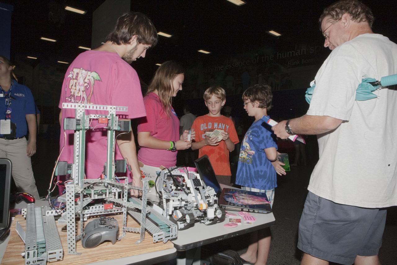 CAPE CANAVERAL, Fla. – Children participate in educational activities during Kennedy Space Center’s Family Night, Sept. 10, at the U.S. Astronaut Hall of Fame in Florida.    NASA and the Kennedy Space Center Visitor Complex hosted the annual NASA family education night. The event, for fifth- through eighth-grade students and their parents, focuses on science, technology, engineering and mathematics (STEM) education activities that included astronaut appearances, a hovercraft, vortex cannon and alternative fuel vehicles. The back-to-school event is part of NASA’s Summer of Innovation initiative to provide interactive learning experiences to middle school students nationwide.  Photo credit: NASA/Amanda Diller