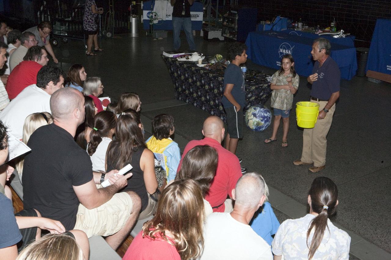 CAPE CANAVERAL, Fla. – Children participate in educational activities during Kennedy Space Center’s Family Night, Sept. 10, at the U.S. Astronaut Hall of Fame in Florida.    NASA and the Kennedy Space Center Visitor Complex hosted the annual NASA family education night. The event, for fifth- through eighth-grade students and their parents, focuses on science, technology, engineering and mathematics (STEM) education activities that included astronaut appearances, a hovercraft, vortex cannon and alternative fuel vehicles. The back-to-school event is part of NASA’s Summer of Innovation initiative to provide interactive learning experiences to middle school students nationwide.  Photo credit: NASA/Amanda Diller