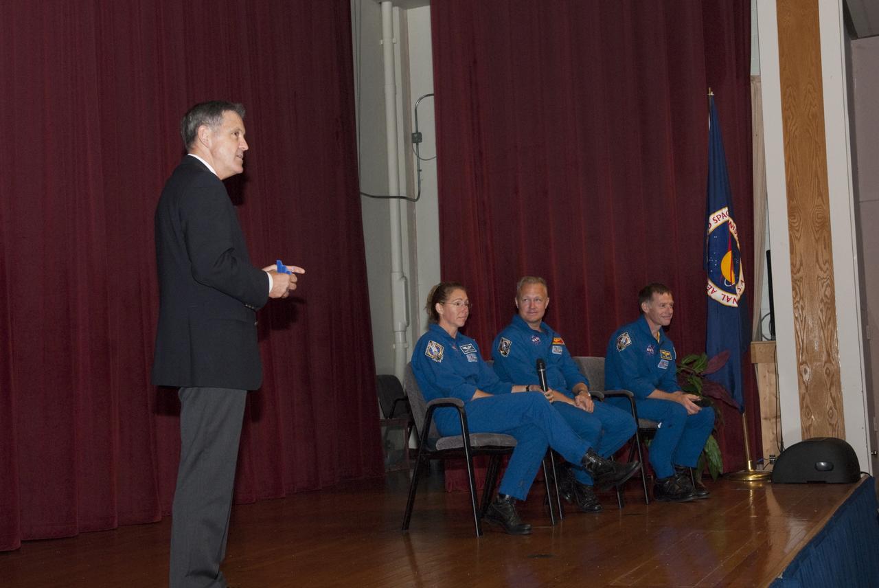 CAPE CANAVERAL, Fla. – Astronauts from Space Shuttle Atlantis’ STS-135 mission return to the Training Auditorium at NASA’s Kennedy Space Center for the traditional post-flight crew return presentation. Commander Chris Ferguson, Pilot Doug Hurley and Mission Specialist Sandra Magnus share personal stories about their experiences. Also on stage is Bob Cabana, Kennedy Space Center’s Director.    STS-135 Mission Specialist Rex Walheim was unable to attend the Kennedy event. In July 2011, Atlantis and its crew delivered to the International Space Station the Raffaello multi-purpose logistics module packed with more than 9,400 pounds of spare parts, equipment and supplies that will sustain station operations for the next year. STS-135 was the 33rd and final flight for Atlantis and the final mission of the Space Shuttle Program. For more information, visit www.nasa.gov/mission_pages/shuttle/shuttlemissions/sts135/index.html. Photo credit: NASA/Jim Grossmann