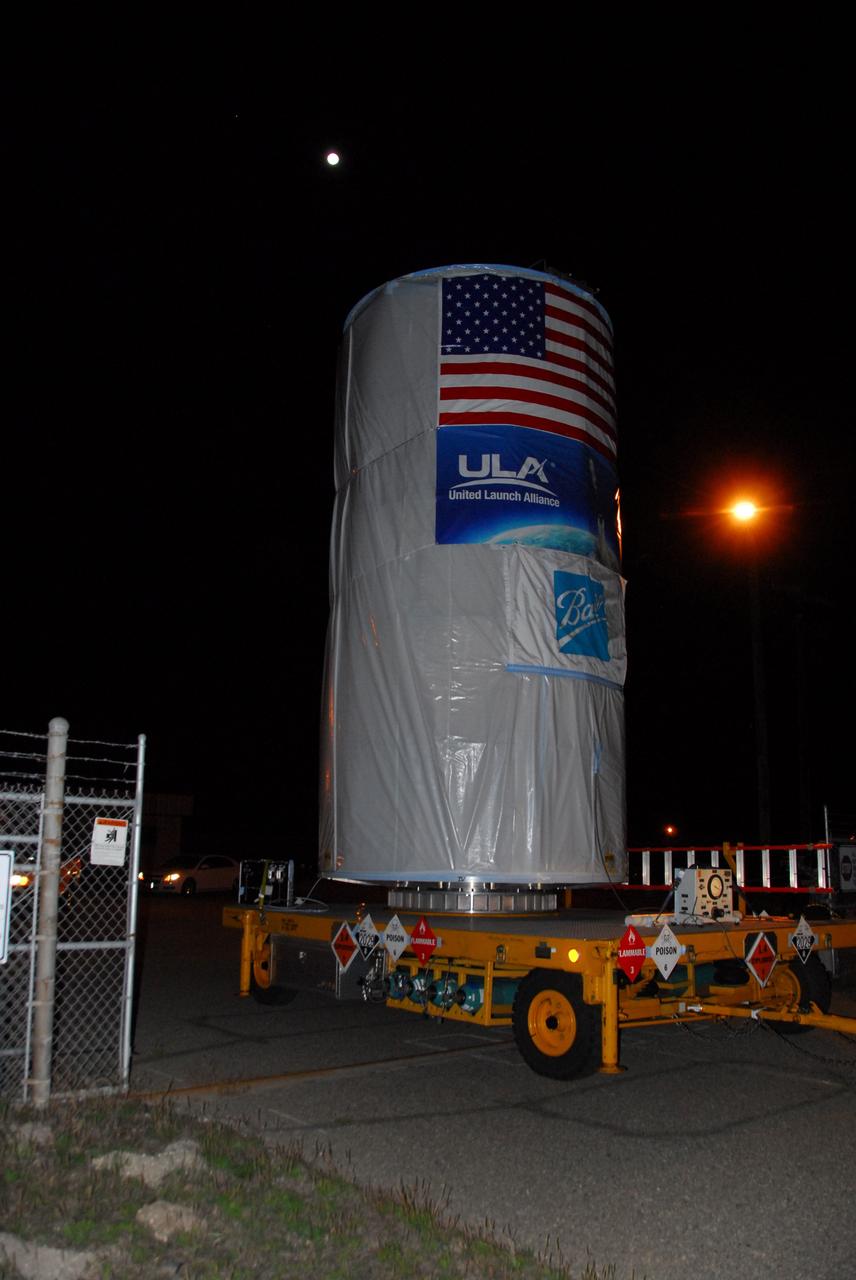 Tucked inside a protective payload transportation canister, NASA’s National Polar-orbiting Operational Environmental Satellite System Preparatory Project (NPP) spacecraft is trucked to launch pad.   NPP represents a critical first step in building the next-generation of Earth-observing satellites. NPP will carry the first of the new sensors developed for this satellite fleet, now known as the Joint Polar Satellite System (JPSS), to be launched in 2016. NPP is the bridge between NASA's Earth Observing System (EOS) satellites and the forthcoming series of JPSS satellites. The mission will test key technologies and instruments for the JPSS missions. NPP is targeted to launch Oct. 28 from Space Launch Complex-2 aboard a United Launch Alliance Delta II rocket. For more information, visit http://www.nasa.gov/NPP.  Photo credit: NASA/VAFB