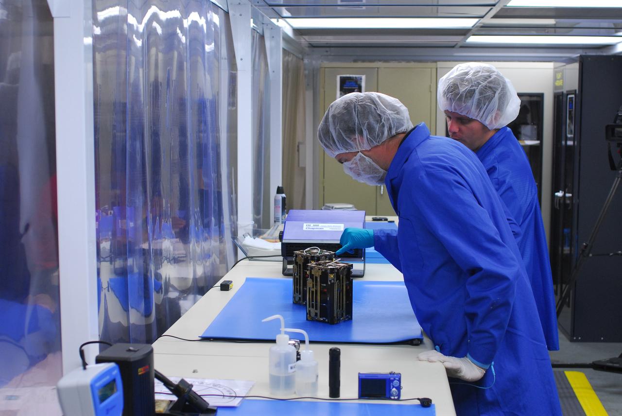 The Dynamic Ionosphere Cubesat Experiment DICE is prepared for launch aboard the Delta II rocket that will carry NASA’s National Polar-orbiting Operational Environmental Satellite System Preparatory Project NPP spacecraft. DICE is a National Science Foundation Project conducted by Utah State University in conjunction with the Atmospheric and Space Technology Research Associates ASTRA.    NPP represents a critical first step in building the next-generation of Earth-observing satellites. NPP will carry the first of the new sensors developed for this satellite fleet, now known as the Joint Polar Satellite System JPSS, to be launched in 2016. NPP is the bridge between NASA's Earth Observing System EOS satellites and the forthcoming series of JPSS satellites. The mission will test key technologies and instruments for the JPSS missions. NPP is targeted to launch Oct. 28 from Space Launch Complex-2 aboard a United Launch Alliance Delta II rocket. For more information, visit http://www.nasa.gov/NPP. Photo credit: NASA/VAFB