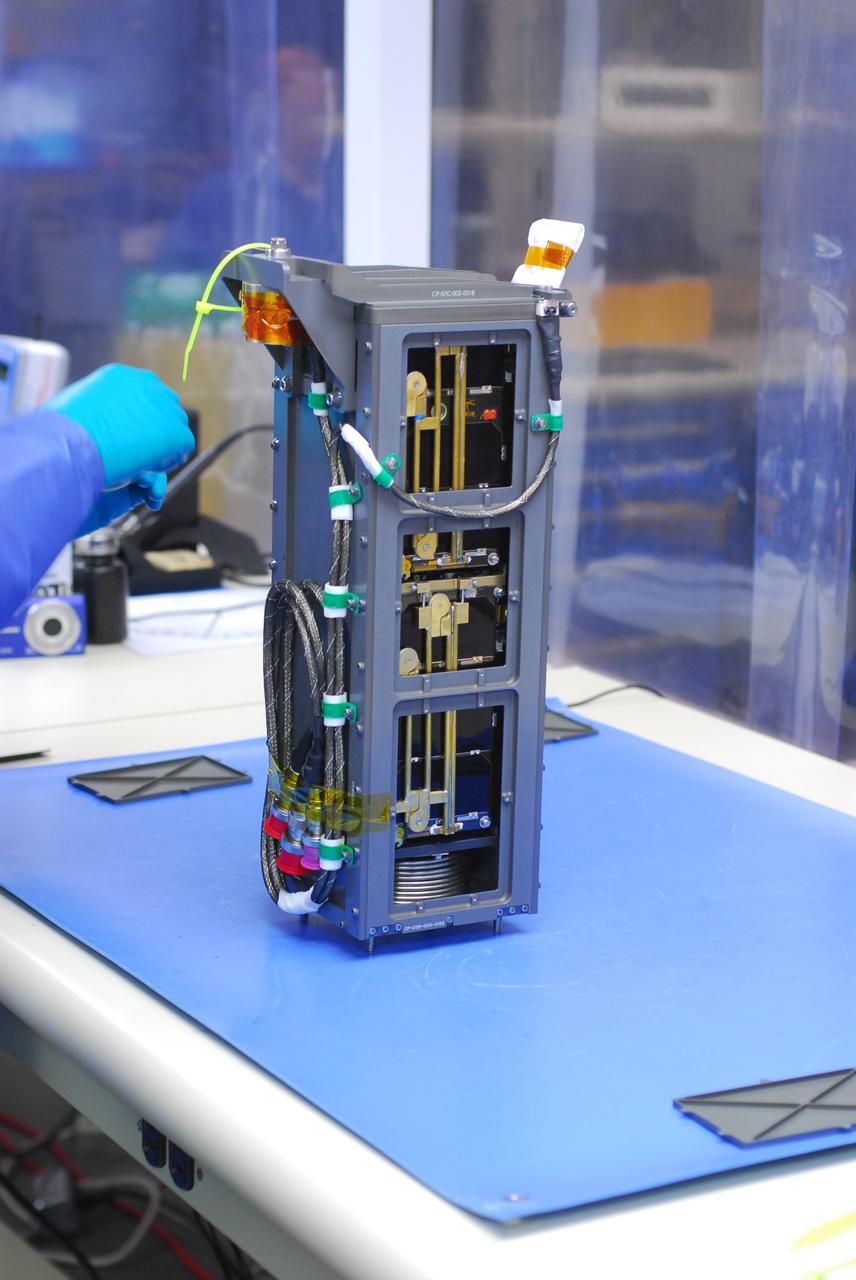 The Dynamic Ionosphere Cubesat Experiment DICE is prepared for launch aboard the Delta II rocket that will carry NASA’s National Polar-orbiting Operational Environmental Satellite System Preparatory Project NPP spacecraft. DICE is a National Science Foundation Project conducted by Utah State University in conjunction with the Atmospheric and Space Technology Research Associates ASTRA.   NPP represents a critical first step in building the next-generation of Earth-observing satellites. NPP will carry the first of the new sensors developed for this satellite fleet, now known as the Joint Polar Satellite System JPSS, to be launched in 2016. NPP is the bridge between NASA's Earth Observing System EOS satellites and the forthcoming series of JPSS satellites. The mission will test key technologies and instruments for the JPSS missions. NPP is targeted to launch Oct. 28 from Space Launch Complex-2 aboard a United Launch Alliance Delta II rocket. For more information, visit http://www.nasa.gov/NPP. Photo credit: NASA/VAFB