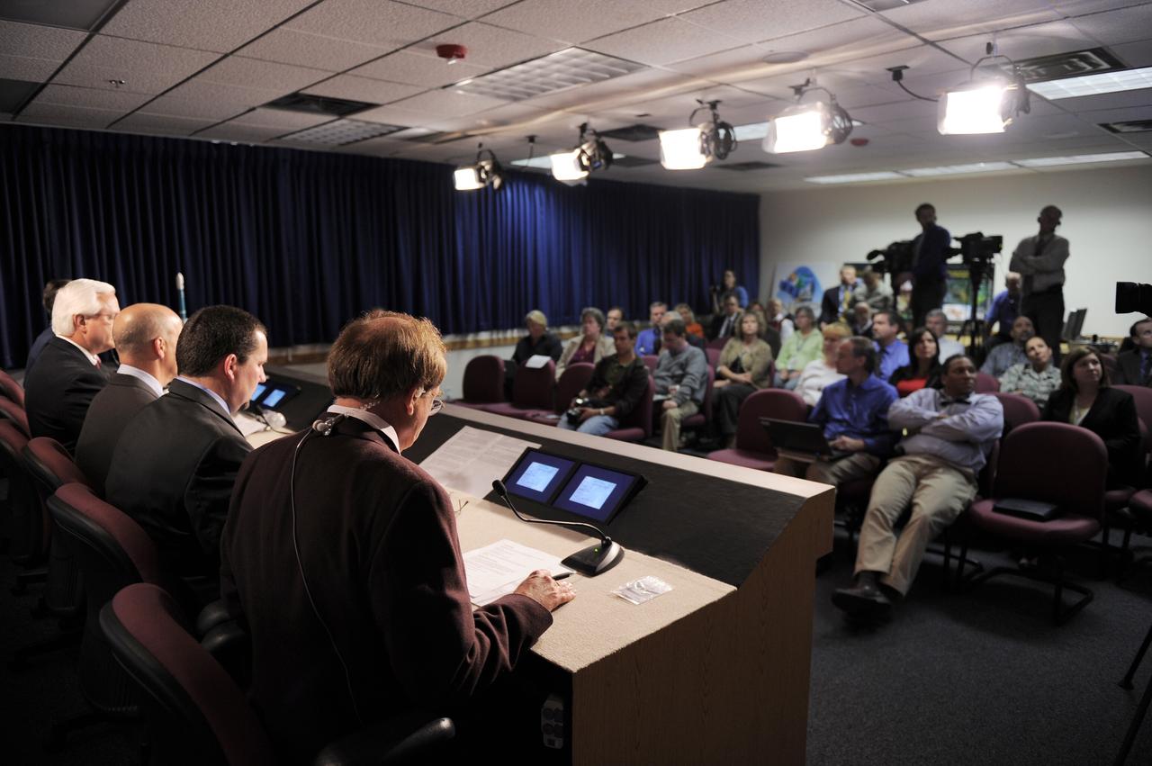 VANDENBERG AIR FORCE BASE, Calif. -- Participants in the prelaunch news conference at Vandenberg Air Force Base, Calif., for NASA’s National Polar-orbiting Operational Environmental Satellite System Preparatory Project (NPP) spacecraft prepare to address members of the news media gathered at Vandenberg Air Force Base, Calif.    NPP represents a critical first step in building the next-generation of Earth-observing satellites. NPP will carry the first of the new sensors developed for this satellite fleet, now known as the Joint Polar Satellite System (JPSS), to be launched in 2016. NPP is the bridge between NASA's Earth Observing System (EOS) satellites and the forthcoming series of JPSS satellites. The mission will test key technologies and instruments for the JPSS missions. NPP is targeted to launch Oct. 28 from Space Launch Complex-2 aboard a United Launch Alliance Delta II rocket. For more information, visit http://www.nasa.gov/NPP.     Photo credit: NASA/VAFB