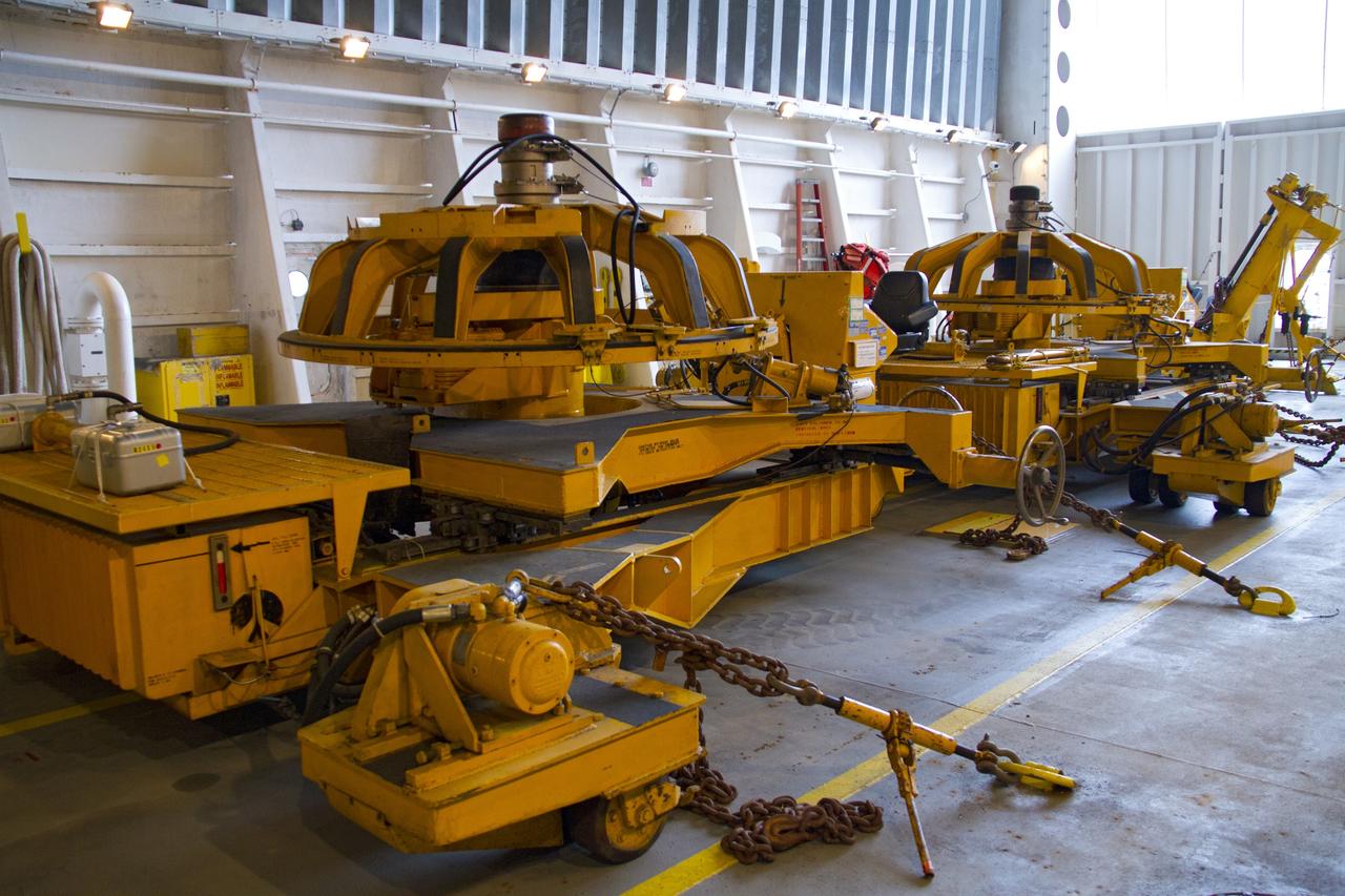 CAPE CANAVERAL, Fla. – At the Turn Basin in the Launch Complex 39 area of NASA’s Kennedy Space Center in Florida, parts of the Hyster forklift, a specially designed engine installer used in conjunction with the space shuttle main engines (SSME), are stowed away inside the Pegasus barge, ready for transport for delivery to Stennis Space Center near Bay St. Louis, Miss. Since being delivered to NASA in 1999, Pegasus sailed 41 times and transported 31 shuttle external fuel tanks from Michoud Assembly Facility near New Orleans to Kennedy. The barge will leave Kennedy, perhaps for the final time. Both the barge and shuttle equipment will remain in storage until their specific future uses are determined. The SSMEs themselves will be transported to Stennis separately for use with the agency’s new heavy-lift rocket, the Space Launch System. The work is part of the Space Shuttle Program’s transition and retirement processing. For more information about Shuttle Transition and Retirement, visit http://www.nasa.gov/mission_pages/transition/home/index.html. Photo credit: NASA/Cory Huston