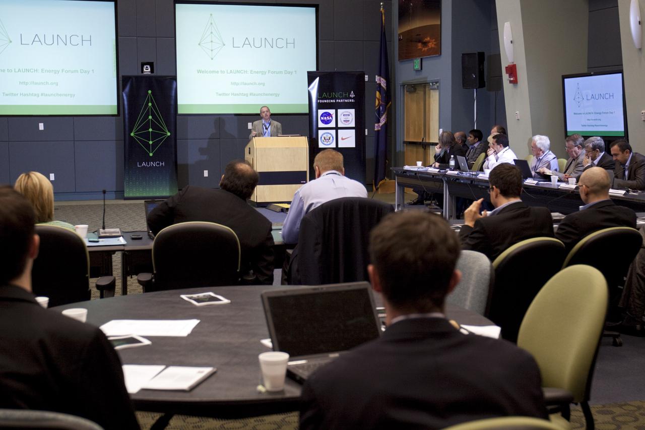CAPE CANAVERAL, Fla. – In the Operations Support Building (OSB) II at NASA's Kennedy Space Center in Florida, one of the many speakers discusses innovative ideas with NASA and partners during a three-day LAUNCH: Energy forum Nov. 11-13. This third in a series of forums is part of an ongoing initiative to identify, showcase and support innovative approaches to sustainability challenges. LAUNCH allows NASA to propel innovative solutions that help those outside the agency make the connection between our lives on Earth and how we live and work in space. Through the U.S. Agency for International Development (USAID)'s involvement, LAUNCH places a special emphasis on accelerating innovations poised for large scale impact in improving the lives of people in the developing world. During the forum, 10 international participants will showcase new innovations that could address energy problems on Earth and in space. NASA, USAID, Nike Inc., and the U.S. Department of State are LAUNCH founding partners. The partners all contributed to planning the forum, selecting innovators and recruiting other event participants. Photo credit: NASA/Kim Shiflett