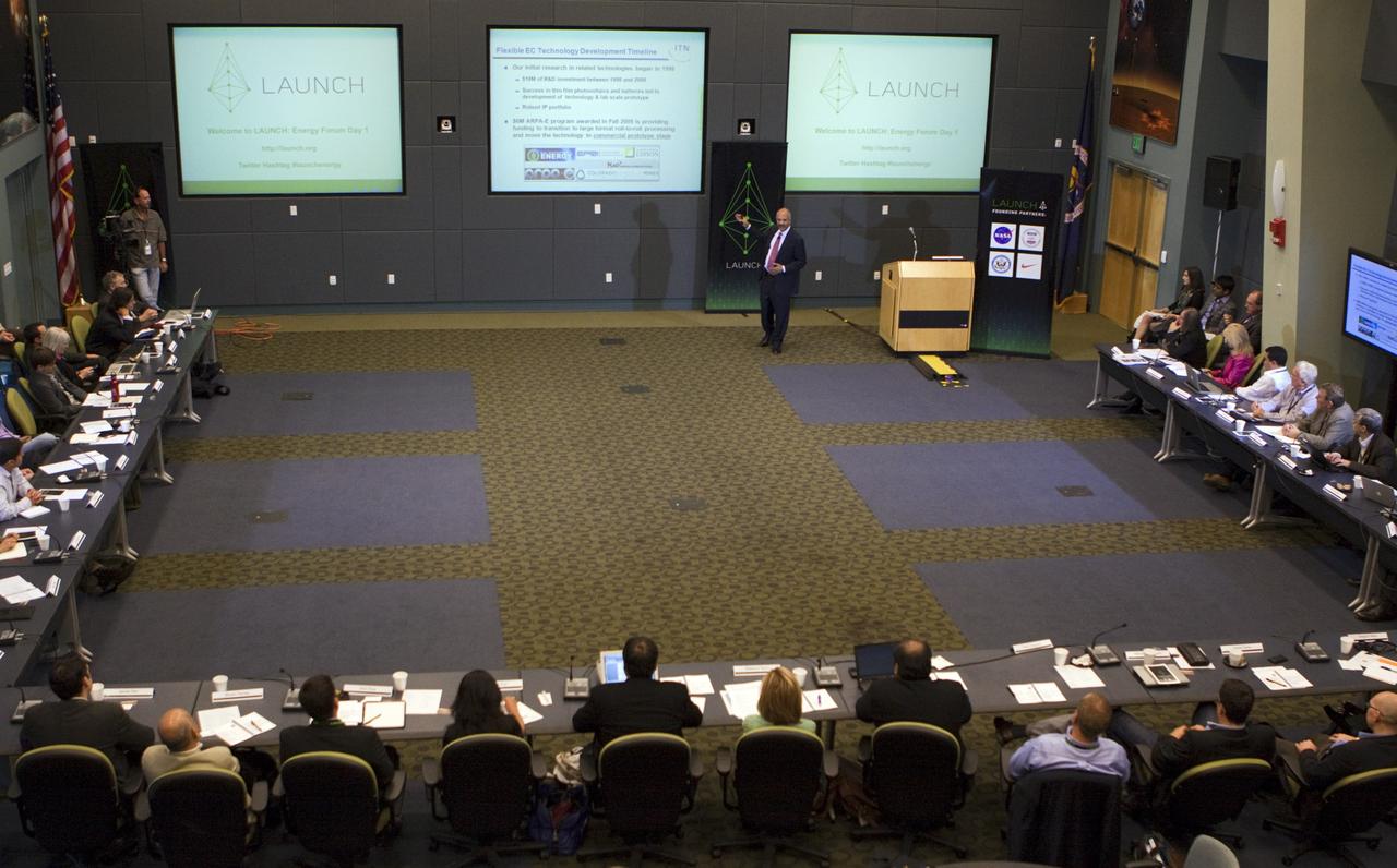 CAPE CANAVERAL, Fla. – In the Operations Support Building (OSB) II at NASA's Kennedy Space Center in Florida, one of the many speakers discusses innovative ideas with NASA and partners during a three-day LAUNCH: Energy forum Nov. 11-13. This third in a series of forums is part of an ongoing initiative to identify, showcase and support innovative approaches to sustainability challenges. LAUNCH allows NASA to propel innovative solutions that help those outside the agency make the connection between our lives on Earth and how we live and work in space. Through the U.S. Agency for International Development (USAID)'s involvement, LAUNCH places a special emphasis on accelerating innovations poised for large scale impact in improving the lives of people in the developing world. During the forum, 10 international participants will showcase new innovations that could address energy problems on Earth and in space. NASA, USAID, Nike Inc., and the U.S. Department of State are LAUNCH founding partners. The partners all contributed to planning the forum, selecting innovators and recruiting other event participants. Photo credit: NASA/Kim Shiflett