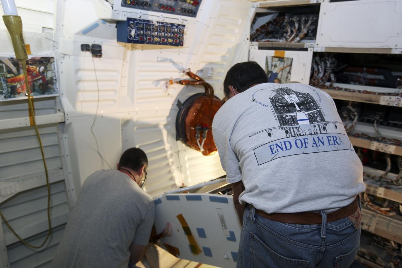 CAPE CANAVERAL, Fla. – Inside Orbiter Processing Facility-1 at NASA’s Kennedy Space Center in Florida, technicians prepare to install the shuttle orbiter repackaged galley (SORG) in the middeck of space shuttle Discovery. After Discovery’s final mission, STS-133, the SORG was removed and sent to a United Space Alliance lab in Houston where it was cleaned and deserviced. Water in the microbial check valve and the orbiter water system was drained and dried. The SORG was returned to Kennedy Space Center. The work is part of the Space Shuttle Program’s transition and retirement processing of shuttle Discovery, which is being prepared for display at Smithsonian’s National Air and Space Museum, Steven F. Udvar-Hazy Center in Chantilly, Va. For more information, visit http://www.nasa.gov/shuttle. Photo credit: NASA/Dimitri Gerondidakis