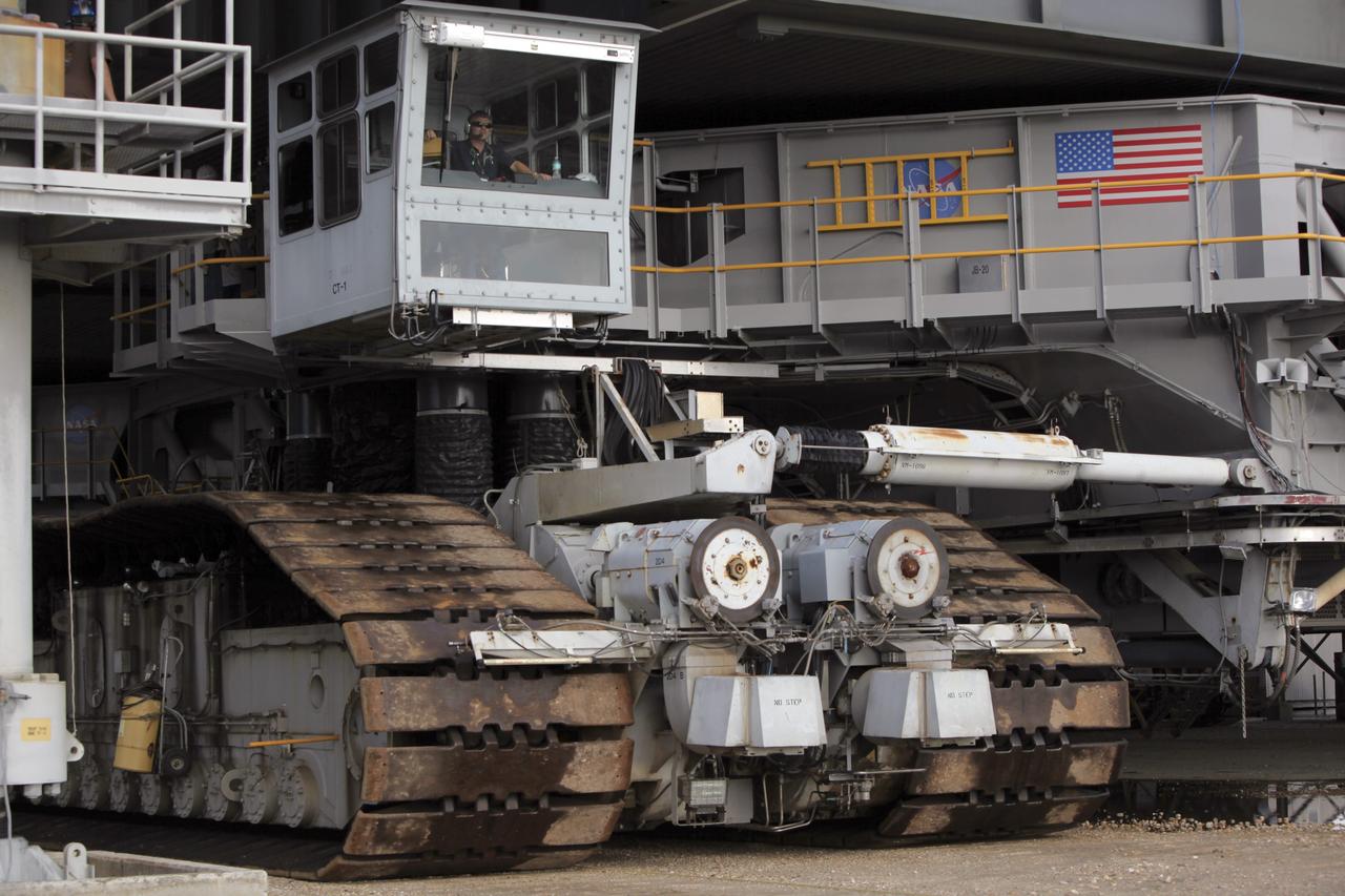 CAPE CANAVERAL, Fla. – At NASA’s Kennedy Space Center in Florida, the crawler-transporter is being prepared to move the mobile launcher (ML) from next to Kennedy's Vehicle Assembly Building to Launch Pad 39B, a distance of 4.2 miles. Data on the ML will be collected from structural and functional engineering tests and used for the next phases of construction. The 355-foot-tall ML structure, which took about two years to construct, is being modified to support NASA’s Space Launch System (SLS), the heavy-lift rocket that will launch astronauts farther into space than ever before. SLS will also create high-quality jobs here at home, and provide the cornerstone for America's future human space exploration efforts. Photo credit: NASA/Dimitri Gerondidakis